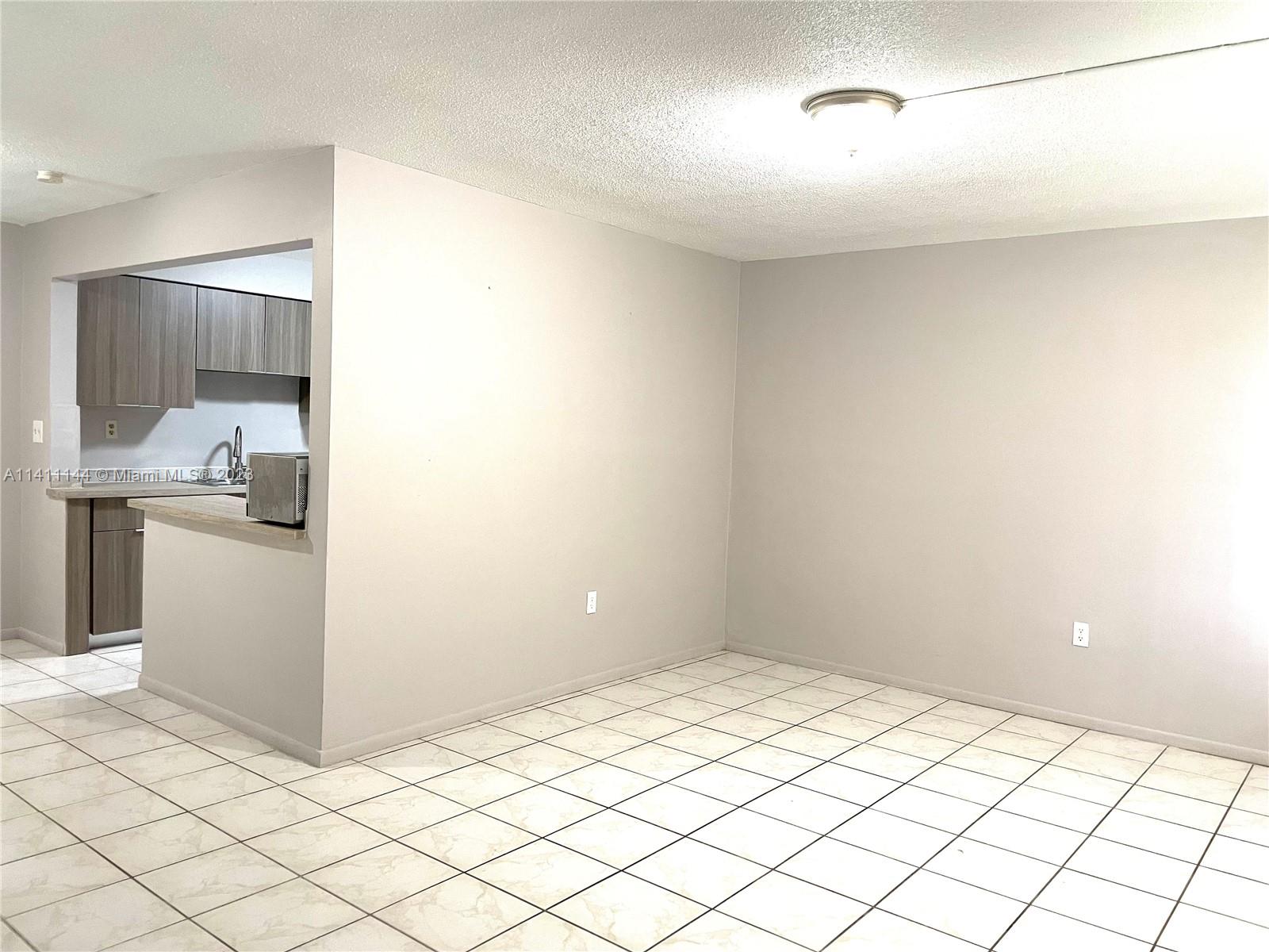Great price for this 2 bedroom, 1.5 bathrooms single family home with a newer roof (2022). Just painted and cleaned for a new buyer.
The house needs a personal touch and has great potential! All tile floors, small office space, nice Florida room 
overlooking a huge fenced backyard (which can be used as a 3rd room) and a garage.
The house is spacious and full of light - come see it today.
