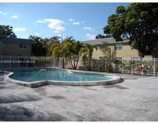 TOWNHOMES OF PLANTATION - Residential Lease