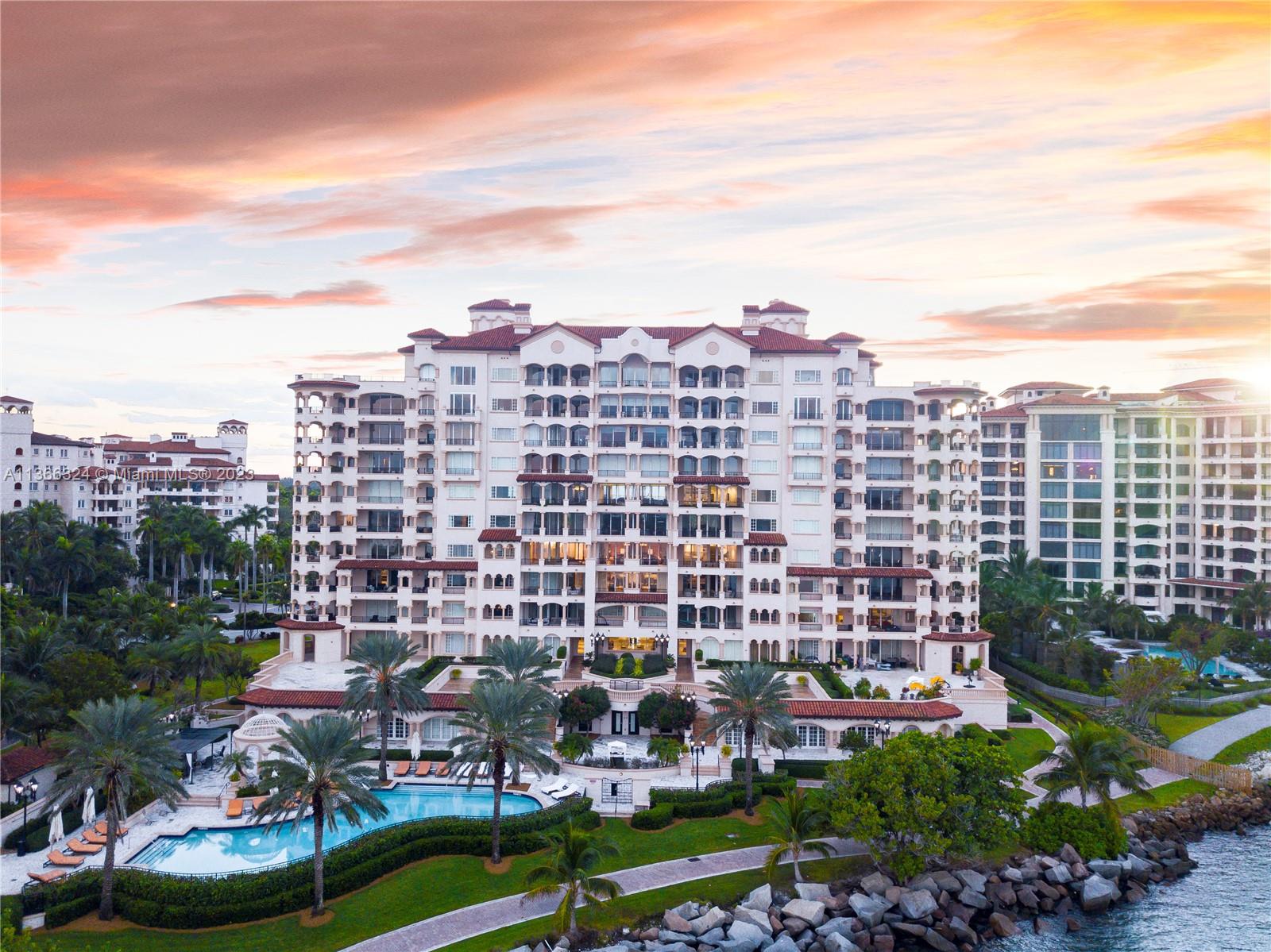Coveted large 4BR ground floor unit in Palazzo Del Mare! Boasting ultra luxurious contemp finishes & decor in serene neutral colors. Soaring ceilings, MSTR suite w/cozy library/den & sep his/hers MSTR BA & PVTE TER. Ample brs w/en-suite BA, serene grey limestone flrs. Natural stone throughout, chandeliers & fixtures by Waterworks. Includes 3 GAR parking spcs, A/C STGE & one golf cart. Expansive 4000+/-SF TER w/summer KIT perfect for entertaining. Breathtaking SOBE views. Discrepancy between MLS and tax rolls the correct total 4,861 SF(as per floor plan)