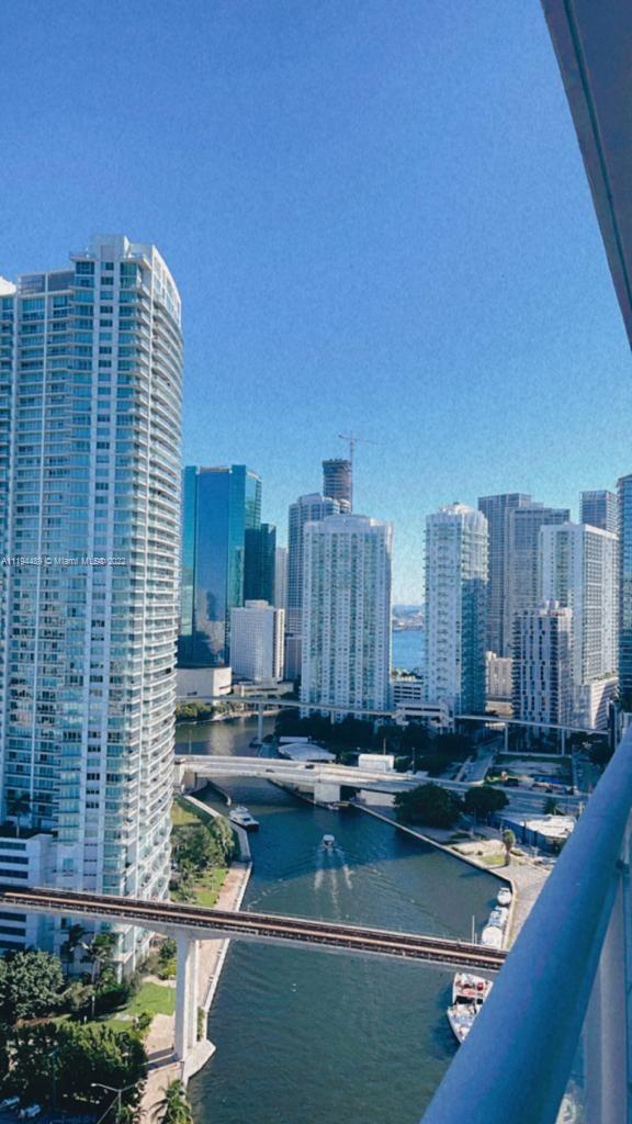Gorgeous 2 bedroom / 2.5 bathroom unit on the 27th floor! Miami skyline, Miami River and Bay views from this great unit at Latitude on the River. Unit is in amazing condition and offers a very spacious layout. Features an open design kitchen, stainless steel appliances, wood cabinets, granite countertops, brand new microwave, and less than 2 years old washer/dryer and window treatments. Floor to ceiling glass with impact windows. Ideally located in north Brickell, minutes from I-95 and the airport, close to Mary Brickell Village & Brickell City Center, and walking distance to stores, Publix, restaurants, and Brickell nightlife. Amenities include infinity pool with poolside bar and TV's, whirlpool/spa, sauna, theater, state of the art gym, bicycle storage, party room and lounge/bar area!