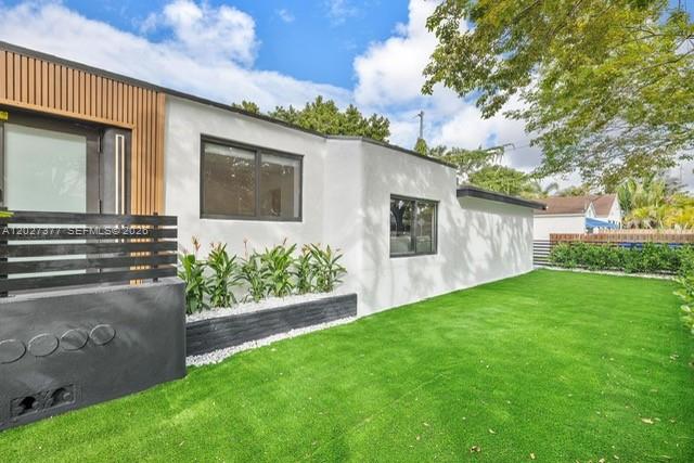 Totally remodeled nice and large single family home for sale in the very well know trendy and historical area "Design District". Partially furnished. Large 3/ 2 + Den. Close to great schools. 10 minutes from the beach, from "Down Town" , from the Miami International Airport. This will be the perfect home for demanding buyers or investor. Easy showing.