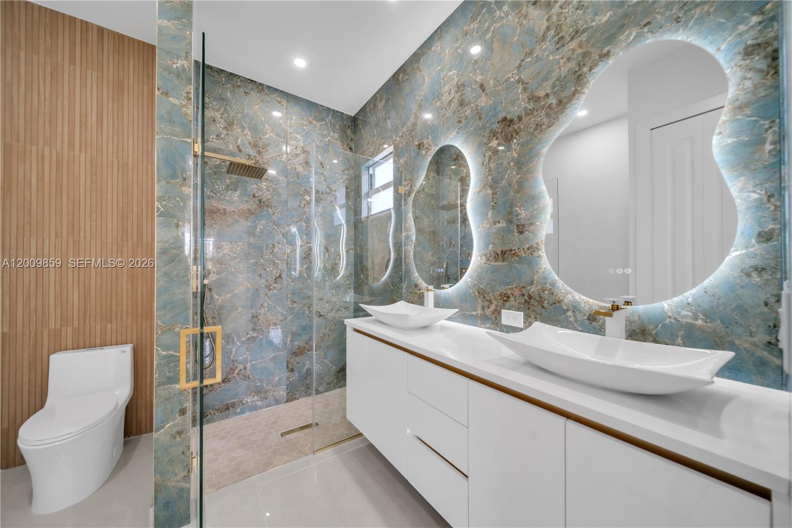 Welcome to this stunning 4-bedroom, 3-full-bath home nestled on a generous half-acre lot, where luxury finishes meet thoughtful design at every turn. A split floor plan provides the perfect balance of privacy and functionality — two bedrooms share a beautifully appointed full bath, while a third bedroom enjoys its own private en-suite with direct access to the lanai, creating an ideal retreat for guests or in-laws.

The master suite is a true sanctuary, featuring a spa-like en-suite bath with dual vanity sinks and upscale finishes. The chef-inspired kitchen impresses with rich granite countertops and a matching granite backsplash throughout. Peace of mind comes standard with impact-resistant windows and doors, while the 2-car garage adds everyday convenience.

With room for everyone to grow, play, and make memories, this home is the perfect place to raise a family in comfort and style.