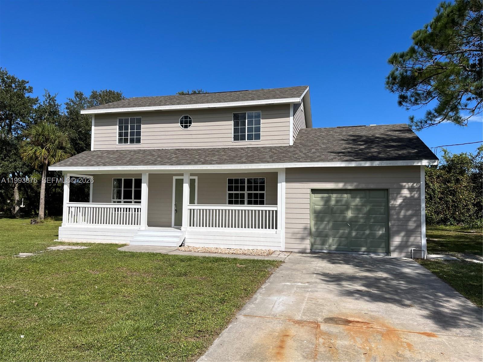 Buy this stunning renovation w garage and build a house for your kids later next door. Almost 1/4 acre lot Completely renovated modern kitchen w designer quartz new stainless appliances. New architectural grade roof. New hvac. 2 level living at its best. Master bath. Include vacant lot next door! making property a half an acre!