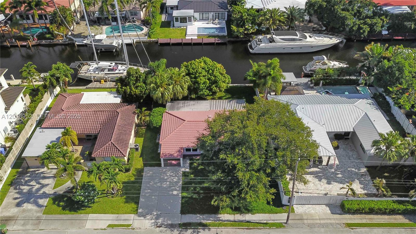 "Experience the best of South Florida waterfront living in the desirable South New River Isles community. This 2-bedroom, 1-bath single-family home features storm-rated impact windows and doors, a covered carport with direct kitchen access, and a spacious fenced backyard with a covered patio overlooking the water.
The true appeal of this property is its waterfront location and access to the South Florida boating lifestyle. Enjoy approximately 65 feet of waterfront frontage with no fixed bridges and a scenic intracoastal ride of approximately 40 minutes to the ocean. Ideally located just minutes from beaches, Las Olas, dining, shopping, Hard Rock Casino, and the Fort Lauderdale pickleball courts, the neighborhood also offers a friendly community feel with great biking and walking routes.
Whether you’re looking for a waterfront retreat, investment opportunity, or future expansion potential, this property offers exceptional lifestyle and location value."