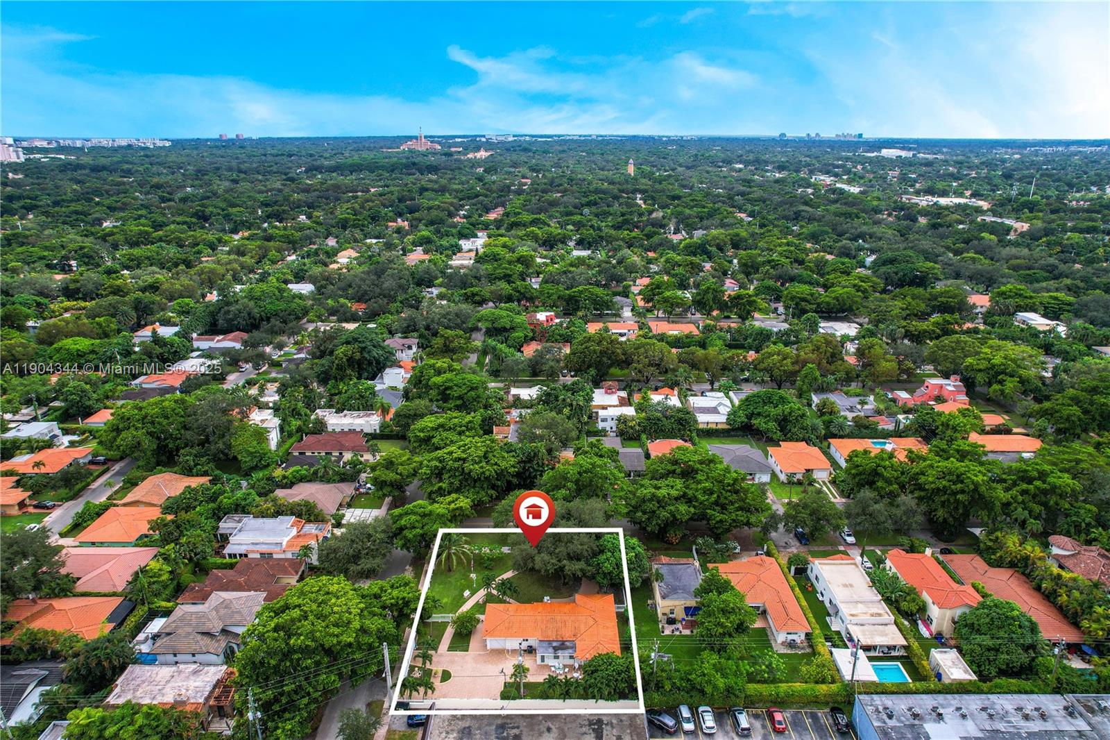 Immaculate Coral Gables residence ideally located minutes from the coveted Golden Triangle! This elegant 4-bedroom, 3-bath home spans 2,415 total sq. ft., blending classic charm with modern updates. Nestled on a sprawling 16,178 sq. ft. gated lot, the property offers a secured wrought-iron fence, mature landscaping, and ample parking. Enjoy bright living and dining areas, a comfortable family room, a well-appointed kitchen, and an updated primary suite. The air-conditioned garage provides flexible use as storage, gym, or workspace. Expansive outdoor spaces are perfect for entertaining or relaxing. A rare three-lot offering with potential for expansion or new construction. Convenient to Brickell, top schools, shopping, dining, and Miami Airport.