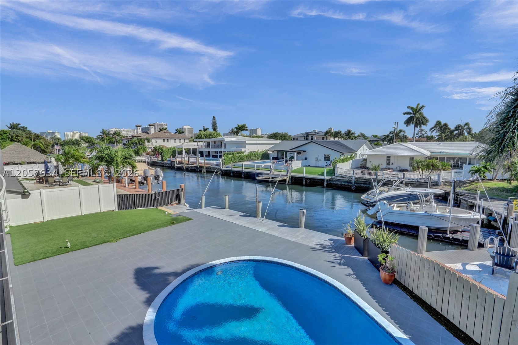 Experience the ultimate South Florida waterfront lifestyle in this exceptional residence, ideally located in the prestigious Coral Ridge neighborhood. Offering direct ocean access with no fixed bridges, this property is a boater’s dream.

Thoughtfully updated, the home features all new impact windows and doors, allowing abundant natural light and coastal breezes to fill the interior. Italian porcelain flooring extends throughout the spacious living areas, including a grand living room with soaring ceilings and a generous family room that flows seamlessly into the kitchen, all overlooking the pool and private dock.

Enjoy the convenience of being just minutes from Cardinal Gibbons High School, Coral Ridge Country Club, world-class shopping, dining, beaches, and all that Fort Lauderdale has to offer.

An exceptional opportunity to enjoy luxury waterfront living in one of Fort Lauderdale’s most sought-after neighborhoods. More than a home it’s a lifestyle.