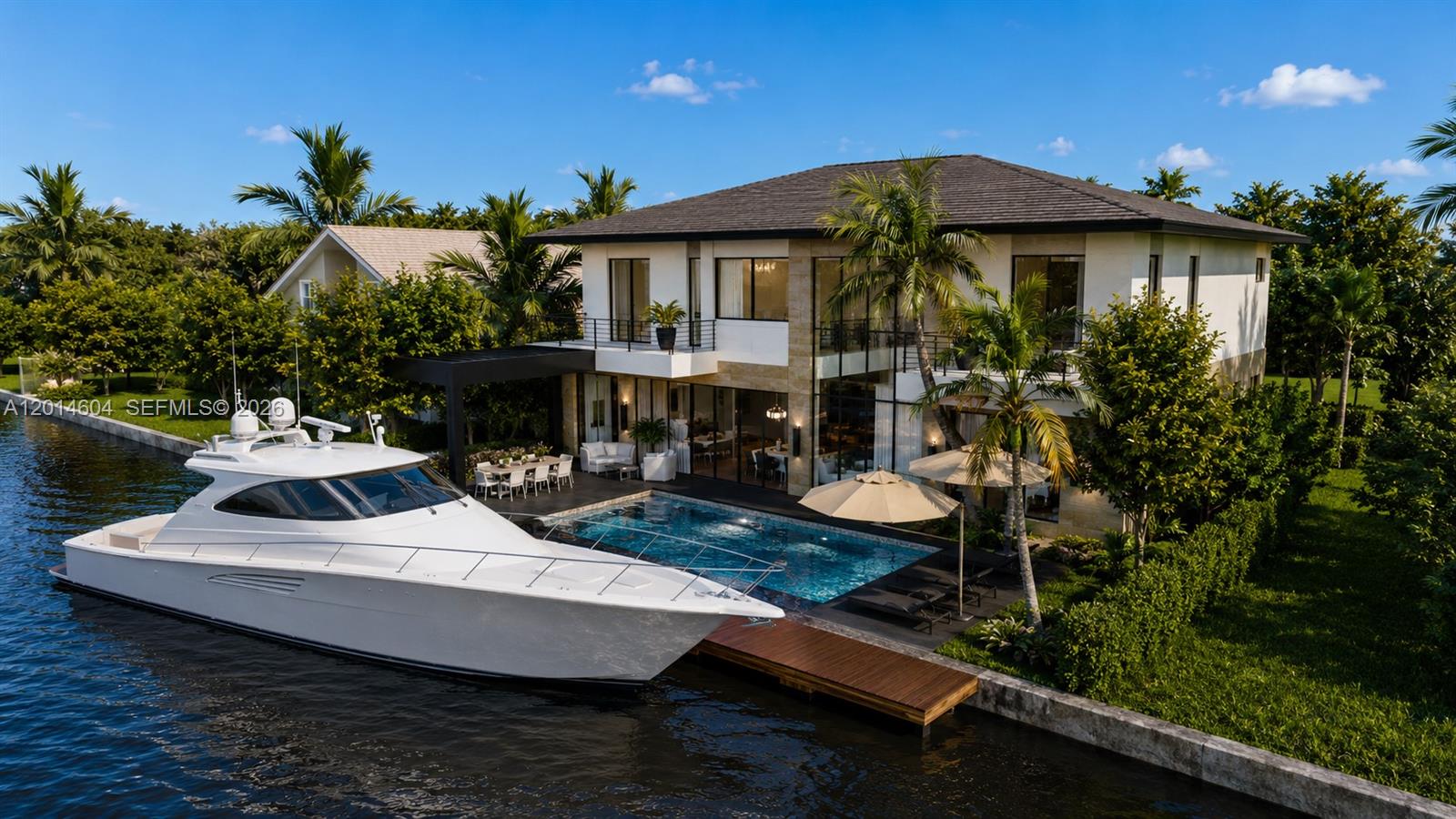 Serenity Key is a new construction waterfront estate coming in 2027 to Deerfield Beach. This architecturally refined two-story residence offers 4 bedrooms, 4.5 bathrooms, 4,572 SF under air, and 5,335 total SF including covered terraces and garage space. Positioned on an 8,000 SF lot with approximately 72-80 feet of deep-water frontage, the home is located on the Intracoastal Waterway with no fixed bridges and rapid ocean access via Hillsboro Inlet.

Designed to maximize natural light, water views, and seamless indoor-outdoor living, the residence features expansive floor-to-ceiling glass, and open-concept living spaces ideal for entertaining and daily living. The chef’s kitchen is designed with custom cabinetry, premium stone surfaces, oversized island seating, and integrated high-end appliances.

The flexible floorplan includes a primary suites on the main level and an additional upstairs primary suite, creating ideal accommodations for multigenerational living or extended guests. Additional amenities include a private elevator, dedicated office, theater room, spacious waterfront terraces, and refined contemporary finishes throughout.

Outdoor living is centered around a resort-style pool, covered lounge areas, and a private dock. Ideally positioned between Boca Raton and Fort Lauderdale and minutes from Deerfield Beach’s dining, marina, golf, and beachfront lifestyle.

Estimated completion 2027. Renderings, plans, and specifications subject to change.
