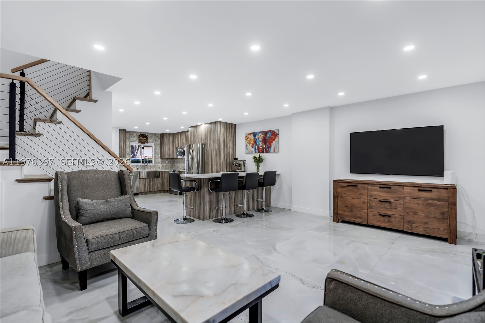 Beautifully renovated 3BR/2.5BA garden apartment townhouse in Hollywood Gardens Condo offering modern elegance and upscale finishes throughout. This move-in-ready residence features a bright, open first floor enhanced by oversized porcelain tile flooring that creates a sleek and sophisticated ambiance. The stunning European style kitchen is thoughtfully designed with quartz countertops, contemporary cabinetry, and premium finishes perfect for everyday living and entertaining.

Upstairs, spacious bedrooms provide comfort and functionality, complemented by custom-built closet interiors for exceptional organization and storage. Stylish zebra blinds add a designer touch to each room while maintaining privacy and natural light control.

Enjoy tranquil garden views and the convenience of two or more assigned parking spaces. Ceramic and tile flooring throughout ensures durability and easy maintenance.

A true blend of comfort, style, and modern luxury living. Don’t miss this opportunity schedule your private showing today!