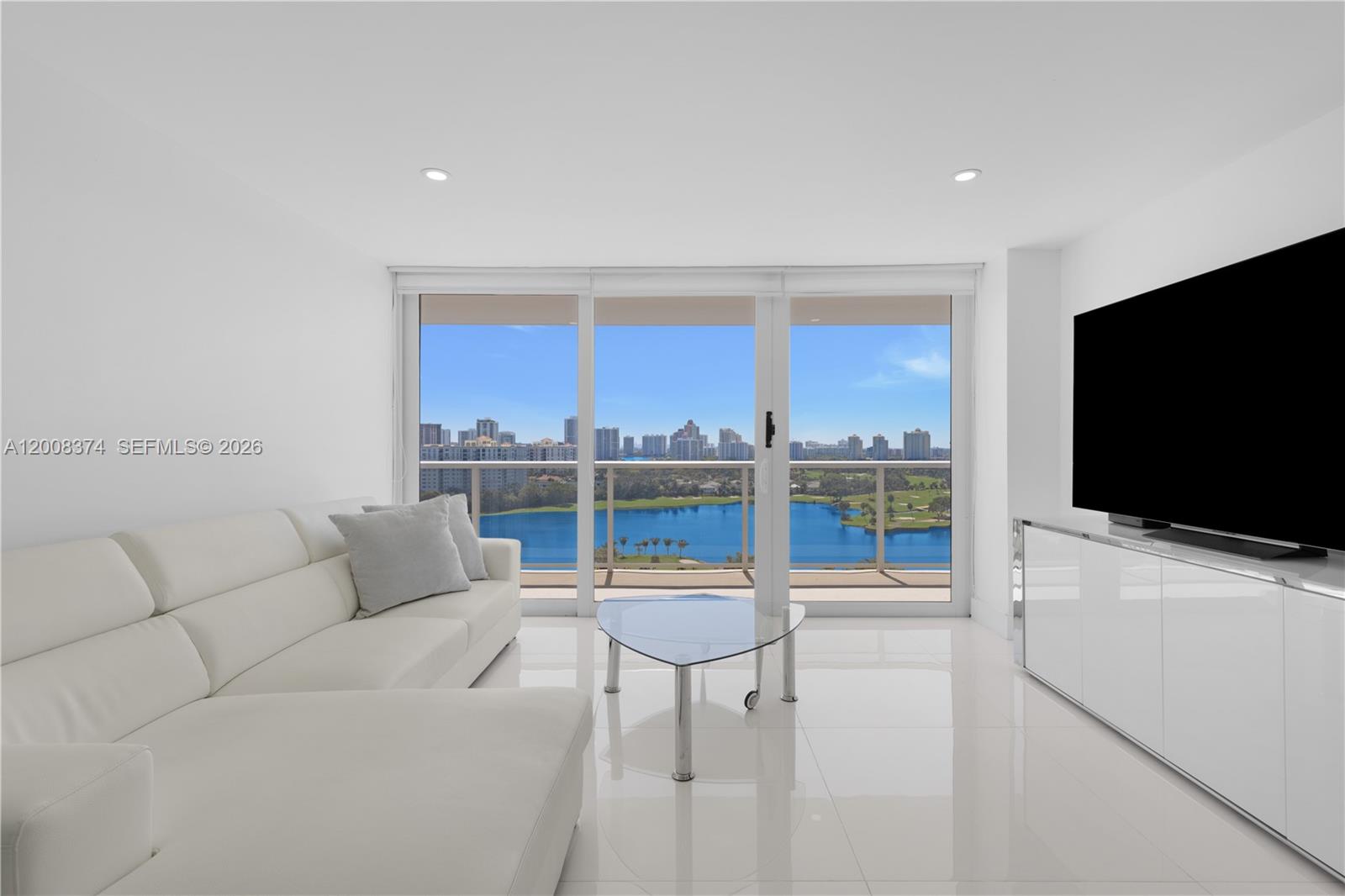 Step into luxury with this impeccably remodeled split bedroom, 2-bed, 2-bath residence at the prestigious Flamenco Condo in Aventura. Boasting an expansive balcony with breathtaking views of the exclusive Turnberry Golf Course, this unit is designed for elegance and comfort. Sleek white large-format tile flows throughout,complementing the modern kitchen with custom cabinetry, granite countertops, and top-tier stainless steel appliances. Spa-inspired bathrooms feature glass enclosures for a refined touch. Offered fully furnished with contemporary décor, this home is move-in ready. Enjoy scenic walks along the 3-mile golf course path or indulge in world-class shopping and fine dining just minutes away at Aventura Mall. A rare opportunity for sophisticated living—don’t miss it!