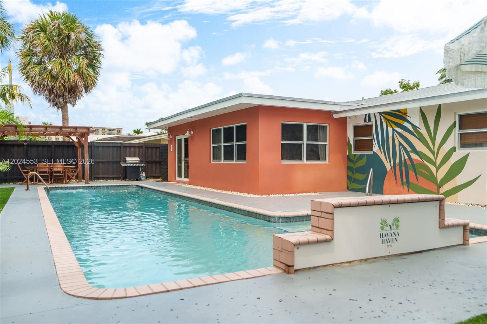 Great investment opportunity. 3-bedroom, 2-bath single-family home featuring a large private in-ground pool with
jets and plenty of outdoor space, ideal for short-term rental use. Major updates include new HVAC (2023),
tankless water heater (2022), electric pool heat pump (2022), and washer and dryer (2022). All impact windows
and doors. One-story home with a metal roof (2020), 1-car garage, no HOA, and short-term rentals permitted.
Centrally located between the beach, Las Olas, and Lauderdale-by-the-Sea. Easy to show.