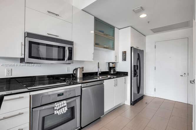 INFINITY AT BRICKELL COND - Residential Lease