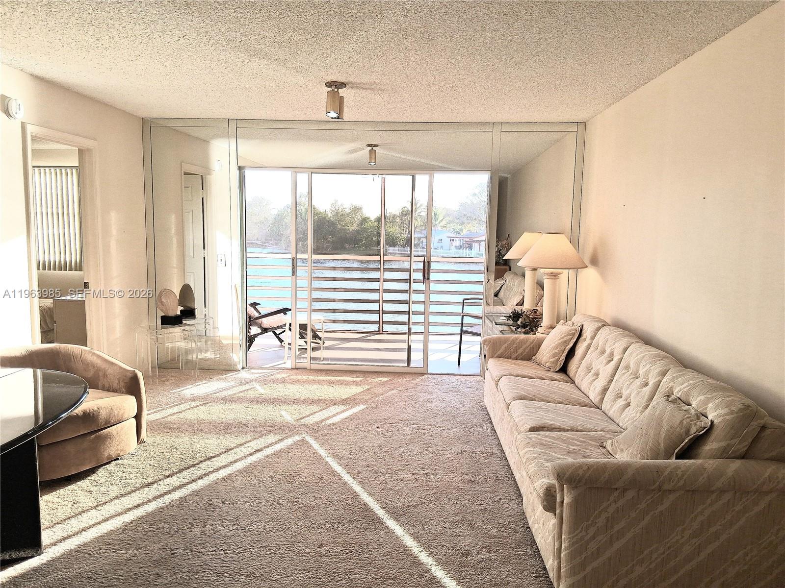 JUST REDUCED AND PRICED TO SELL QUICKLY! BRING YOUR QUALIFIED BUYER AND MAKE AN OFFER! FULLY FURNISHED 2/2 2nd Floor Inside Corner Unit In An Active 55 + Community. ONE OF THE BEST LAKE VIEWS IN ALL SUNRISE LAKES! BEAUTIFUL LAKE VIEW and Spectacular Sunsets! Excellent neighbors, Washer and Dryer Inside The Unit. Extra Storage Room. Amenities Include GOLF, Pool, Jacuzzi, Sauna, Tennis, Pickleball. HOME OF THE FAMOUS SUNRISE EPIC THEATER! Movies, Shows, Dances, Concerts, Zumba & Much More. Shuttle Bus. Only 5 Minutes To Sawgrass Mall & 20-25 Minutes To Fort Lauderdale Airport & Beaches.
