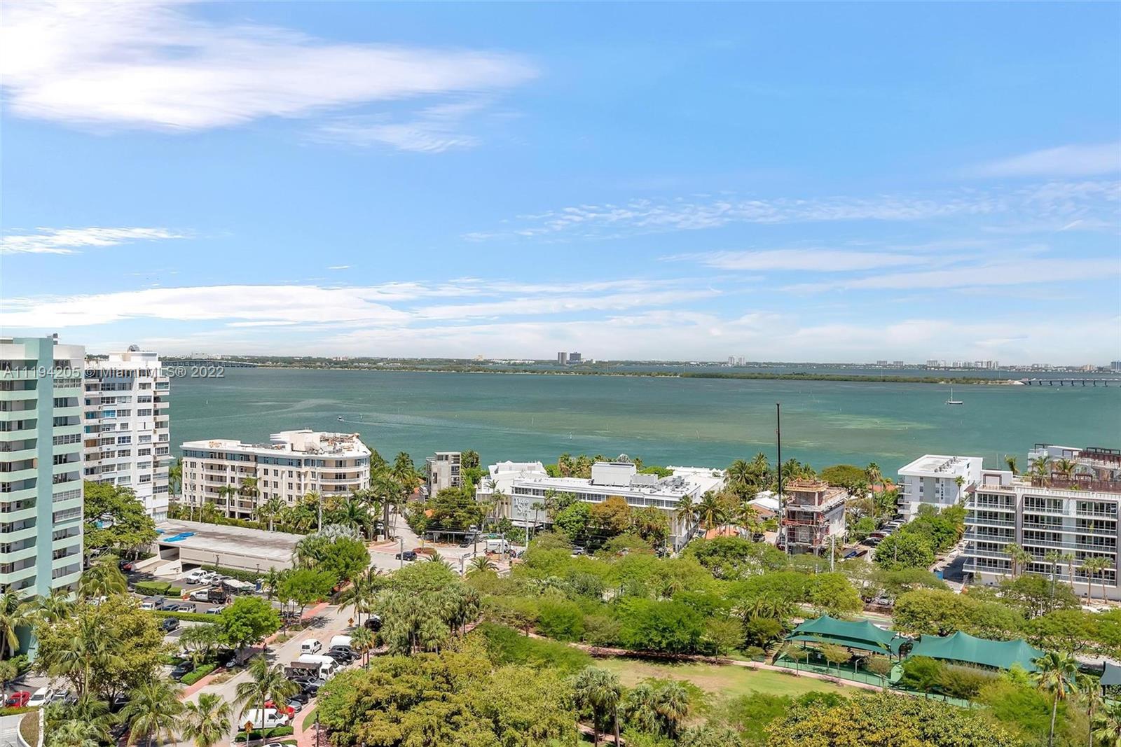 Great opportunity to create your dream home or pied-a-terre in this spacious 1 bedroom / 1.5 bath apartment that is currently being used as an office. Enjoy beautiful water and park views from the wall-to-wall windows and large balcony accessible from both living room and bedroom. Extensive interior renovations almost finished including beautiful new hallways, common areas and gym. Comes with one covered garage space and extra storage unit on the floor. Best value in Costa Brava. Building now allows installation of washer/dryer in the unit.