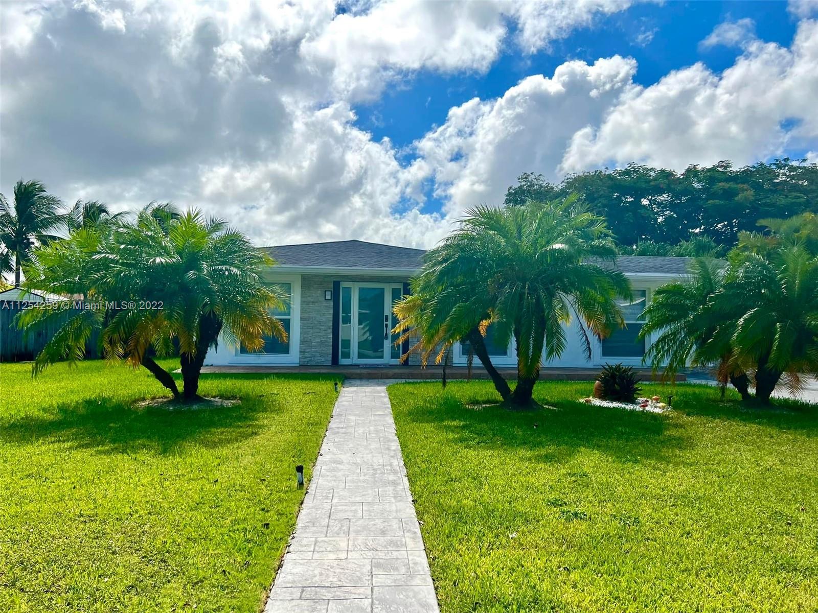This beautiful, fully remodeled, home is a 3 bed 2 bath. It is in perfect condition, fully furnished and equipped. The backyard is a beautiful and lush oasis and very spacious, with large shed for storage, pool, outdoor kitchen, and a shaded outdoor dinning area with fans, the perfect space to relax. It is minutes away from schools, shopping centers, and delicious restaurants. No HOA!!
