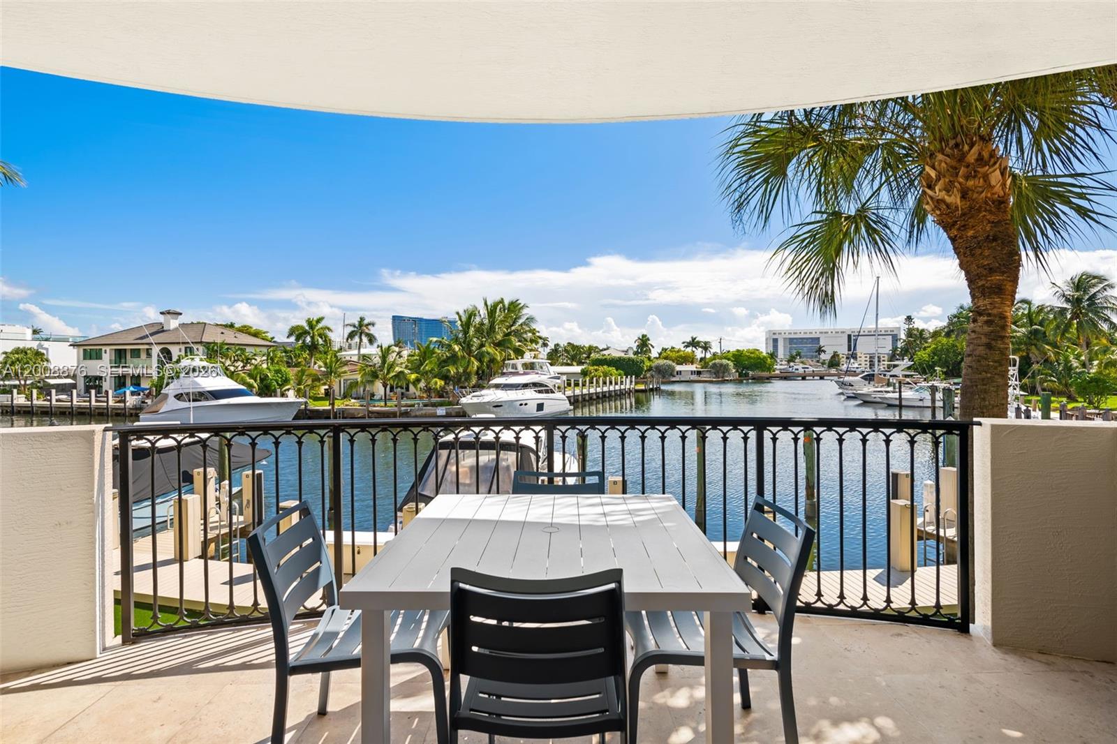 Rare Rio Vista waterfront offering with a 36’ private boat slip that transfers with ownership and direct ocean access with no fixed bridges. Offering the ease of condo living with the feel of a private home, this spacious 2-bedroom + den residence features over 2,100 square feet of living space, with the den ideal as a home office, guest room, or optional 3rd bedroom. Enjoy wide water views from the expansive balcony, perfect for entertaining or relaxing after a day on the water. Interior features include impact glass, Viking appliances with gas range, generous living and dining areas, and a large primary suite with spa-like bath and oversized closets. Located in a boutique building just moments from Lauderdale Yacht Club, downtown Las Olas, beaches, dining, and shopping. Includes 2 covered parking spaces. A rare lock-and-leave boating lifestyle property combining space, location, and
waterfront convenience.