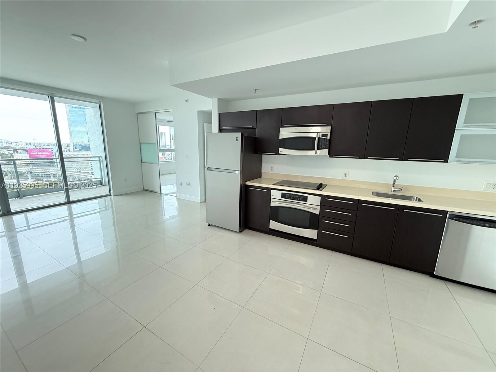 STYLISH 1 BED / 1 BATH AT THE IVY – LIVE IN THE HEART OF BRICKELL. BRIGHT AND OPEN LAYOUT WITH MODERN KITCHEN, STAINLESS STEEL APPLIANCES, PORCELAIN FLOORS THROUGHOUT, AND IN-UNIT WASHER & DRYER. ENJOY CITY + RIVER VIEWS RIGHT FROM YOUR HOME. AMENITIES THAT MATCH YOUR LIFESTYLE: 24-HR SECURITY & FRONT DESK, RESORT-STYLE POOL, FITNESS CENTER & SPA, SUNDECK, PARTY ROOM, PLAYGROUND, VALET, AND MORE. WALK TO BRICKELL CITY CENTRE, MARY BRICKELL VILLAGE, RESTAURANTS, BARS, AND SHOPS. EASY ACCESS TO I-95 & METRO FOR COMMUTE OR WEEKEND GETAWAYS. INTERNET & BASIC CABLE INCLUDED. AVAILABLE NOW AND EASY TO SHOW.