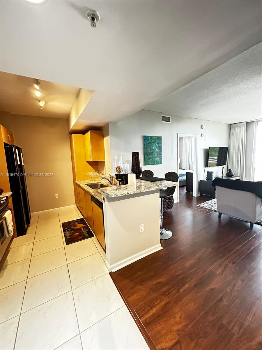 VENTURE AT AVENTURA EAST - Residential Lease