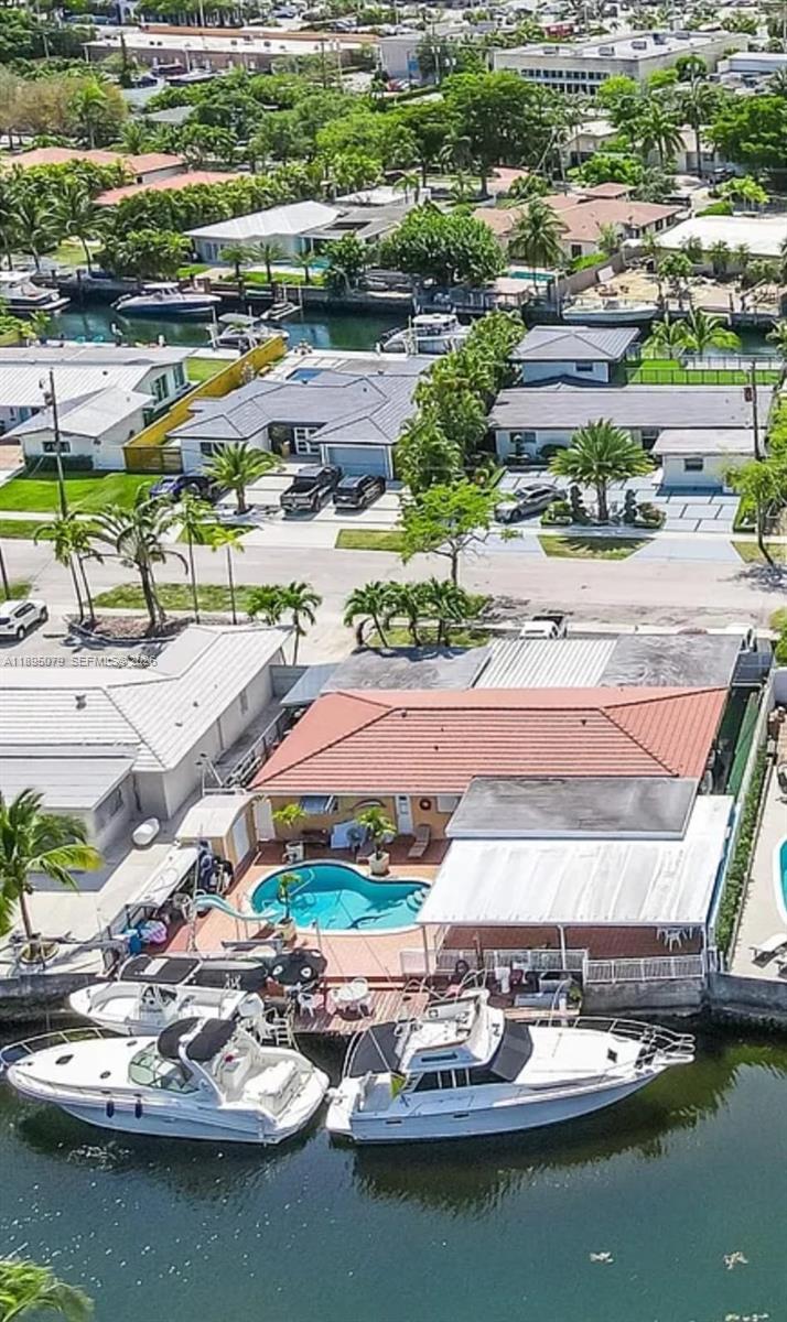 No HOA. Keystone Point is an exclusive gated community, House with pool offering 90 feet of private dock and ocean access for direct through Haulover.