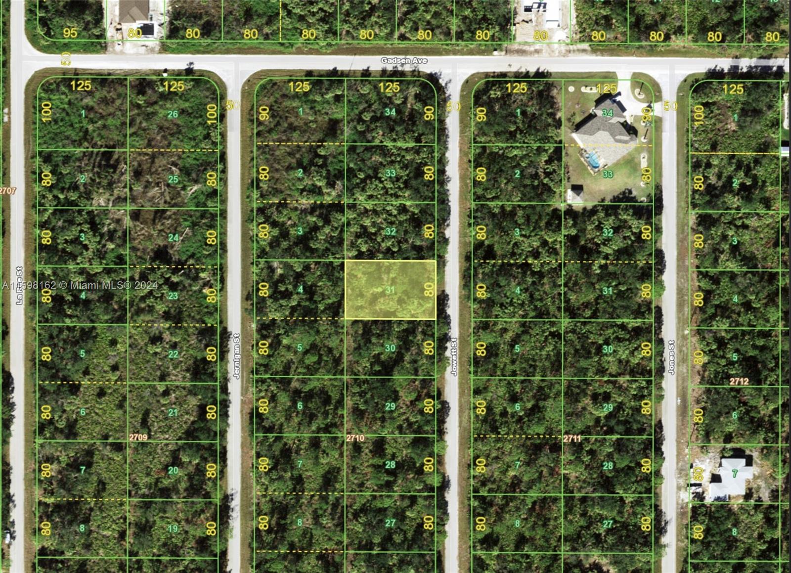 Explore the opportunity to build your dream home on a beautiful lot in the sought-after community of Port Charlotte. This property offers a natural setting that awaits transformation into a bespoke single-family home. Nestled in a tranquil area, it is perfect for those seeking a blend of privacy and accessibility. The lot is surrounded by the charm of Florida's nature and is conveniently close to shopping, dining, and entertainment options. For outdoor enthusiasts, the proximity to stunning Gulf beaches, excellent fishing, and boating opportunities make it an enviable location. This is an excellent choice for anyone looking to enjoy the peaceful yet connected lifestyle of Port Charlotte.