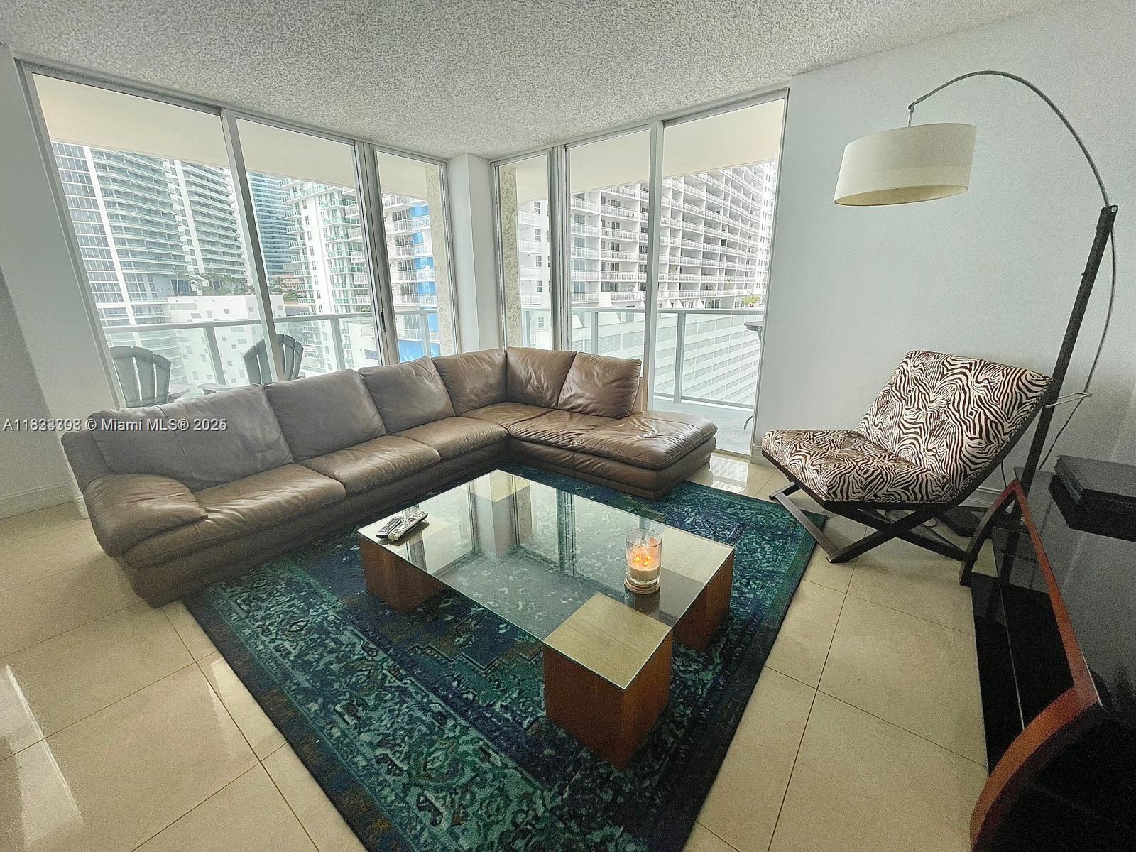Experience luxury living in the vibrant heart of Brickell! This exquisite 2-bed, 2-bath apartment combines modern elegance with urban convenience. Fully renovated bathrooms offer contemporary comfort, while the breathtaking ocean view provides a serene escape. A store within the building adds extra convenience. Mark on Brickell boasts resort-style amenities, including a sparkling swimming pool, a state-of-the-art fitness center, tennis and racquetball courts, and a lush, sun-soaked deck. 48 hours notice for showing. Priced to sell and furnished