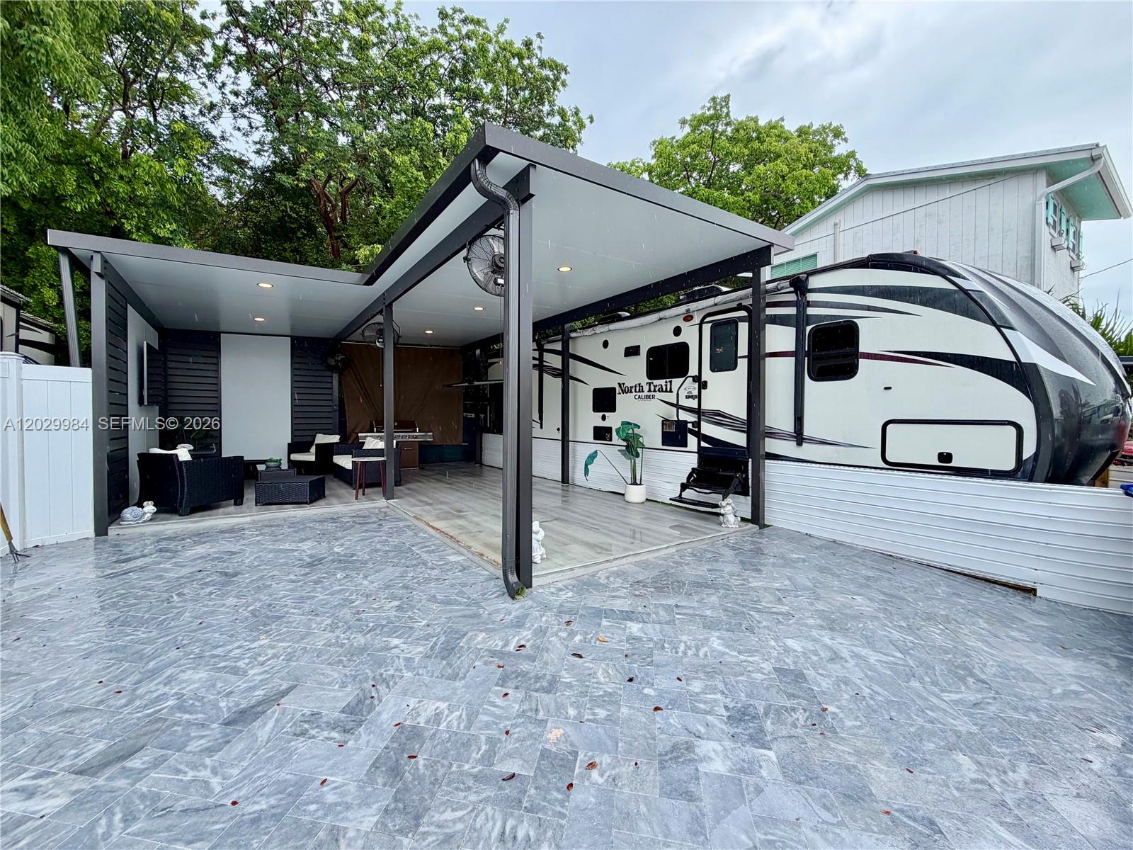 SELLER FINANCING AVAILABLE!! Beautiful lot located in the highly desirable Calusa Campground Resort in the Florida Keys. This RV features a spacious unit with a large master bedroom, full bathroom, a second bedroom with three twin beds, and an open-concept living area. The true highlight of this property is the exceptional outdoor entertainment space. Enjoy a beautifully upgraded gazebo with a paved driveway, custom outdoor bar, large TV entertainment area. Whether you're looking for a personal getaway, seasonal retreat, or income-producing investment, this property offers outstanding flexibility. Calusa is one of the few communities in the Florida Keys with no rental restrictions, making it an excellent opportunity for short-term vacation rentals and year-round income potential. Enjoy the community boat ramp and easy water access, allowing you to launch your boat and enjoy world-class fishing, boating, and waterfront recreation just minutes away.
Located only one hour from Miami, Calusa offers resort-style amenities including a marina, boat ramp, temporary dockage, 24-hour security, swimming pool, tennis and basketball courts, playground, on-site laundry facilities, and a community recreation hall.