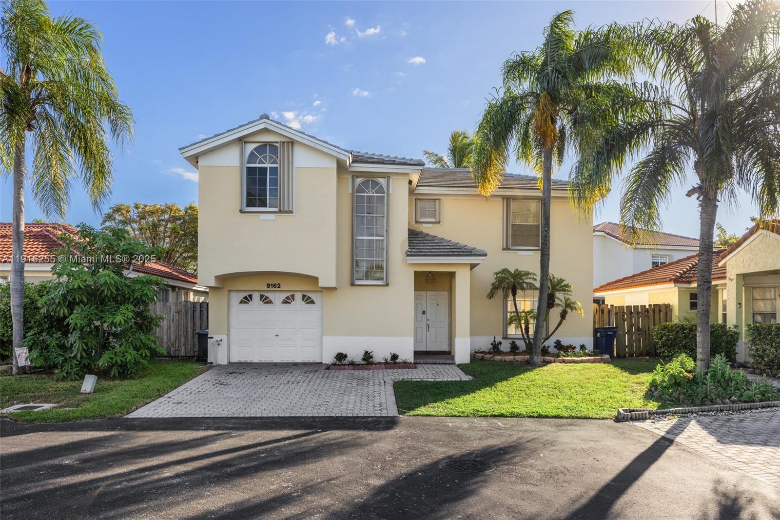 Enjoy serene lake views and radiant sunsets from this beautifully maintained two-story home in Cutler Bay. This 3-bed, 2.5-bath residence offers an open, light-filled layout with a spacious family room, tile floors throughout, and accordion shutters. The kitchen features a cooking island and eat-in space, seamlessly connecting to a screened patio and lush backyard. Upstairs, the primary suite includes dual sinks, a bidet, and a lake view. Nestled in a quiet community with a pool, just moments from parks, top schools, and Black Point Marina.
