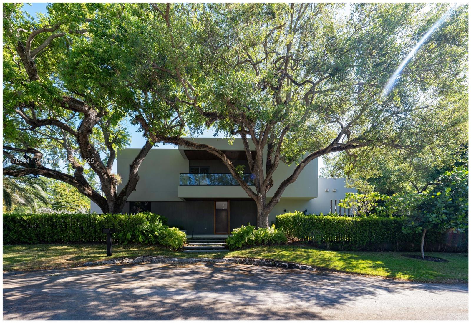 Gather, live, and love in this stunning Coconut Grove estate! Nestled on a spacious 12,750 sqft corner lot, this brand-new home invites warmth and connection. Enjoy family dinners in the gourmet kitchen, or casual gatherings in the expansive outdoor entertainment area, perfect for alfresco dining and making memories. Kids will love the vast yard space, ideal for playtime and happy times. Unwind in the lavish master suite or find serenity in the peaceful spaces perfect for yoga, reading, or quiet moments. Stroll to nearby shops, restaurants, and waterfront activities. Create lifelong memories in this exceptional property, where elegance, comfort, and privacy blend perfectly for raising a family or entertaining loved ones. Welcome home!