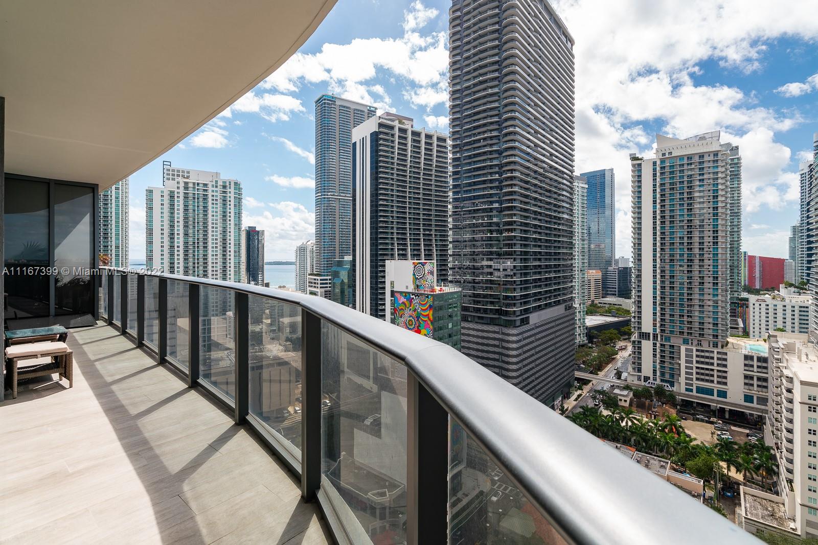 AVAILABLE STARTING JULY UNTIL OCTOBER - Live in style in the heart of Brickell, Miami’s bustling urban downtown center.  This fully furnished luxurious corner unit features a private 270 degree outdoor balcony with incredible city and water views, 9 foot floor to ceiling glass windows throughout the entire unit, GE Monogram kitchen appliances, imported stone countertops, and contemporary European cabinetry.  The building's upscale amenities include a rooftop pool (49th floor) boasting 360 degree views of Miami, 9th floor pool deck with lap pool, state of the art fitness center, entertainment center and much more ! Additionally on the ground level there is a 3 story Equinox and a 3,500sf Soul Cycle Spin Studio. 3 month min rental / 6 month max rental.