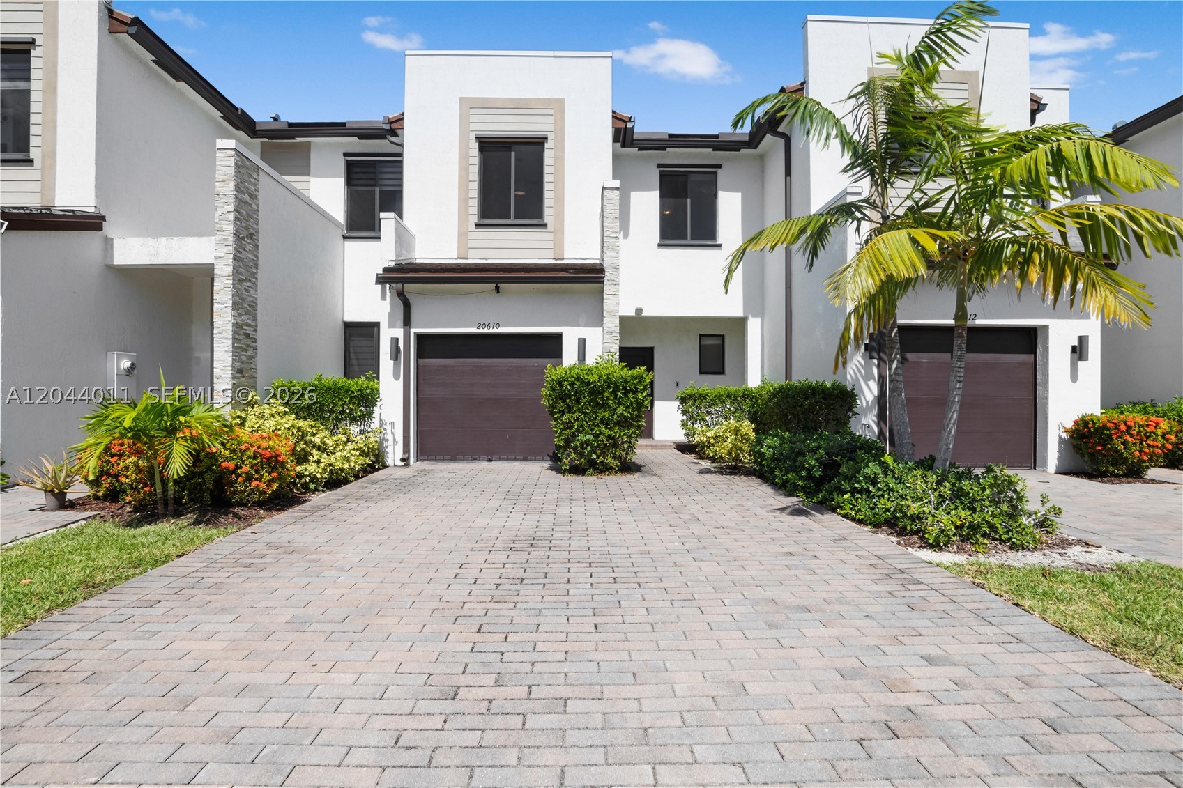 Welcome to this beautiful 3-bedroom, 2.5-bath townhouse built in 2021, offering modern finishes and move-in ready convenience. This well-maintained home features stainless steel appliances, Premium Turkish Stone tiles
and carpet throughout, an in-unit washer and dryer, a 1-car garage, and stunning lake views perfect for relaxing
after a long day. Located within the gated Paseos Resort-Style Community, residents enjoy 24/7 security and
access to exceptional amenities, including a community pool, fitness center, and clubhouse. Ideally situated west of
I-95, this home is just minutes from Aventura Mall, shopping, dining, entertainment, and only 15 minutes from
North Miami Beach. Don't miss this opportunity to enjoy resort-style living in a prime location.