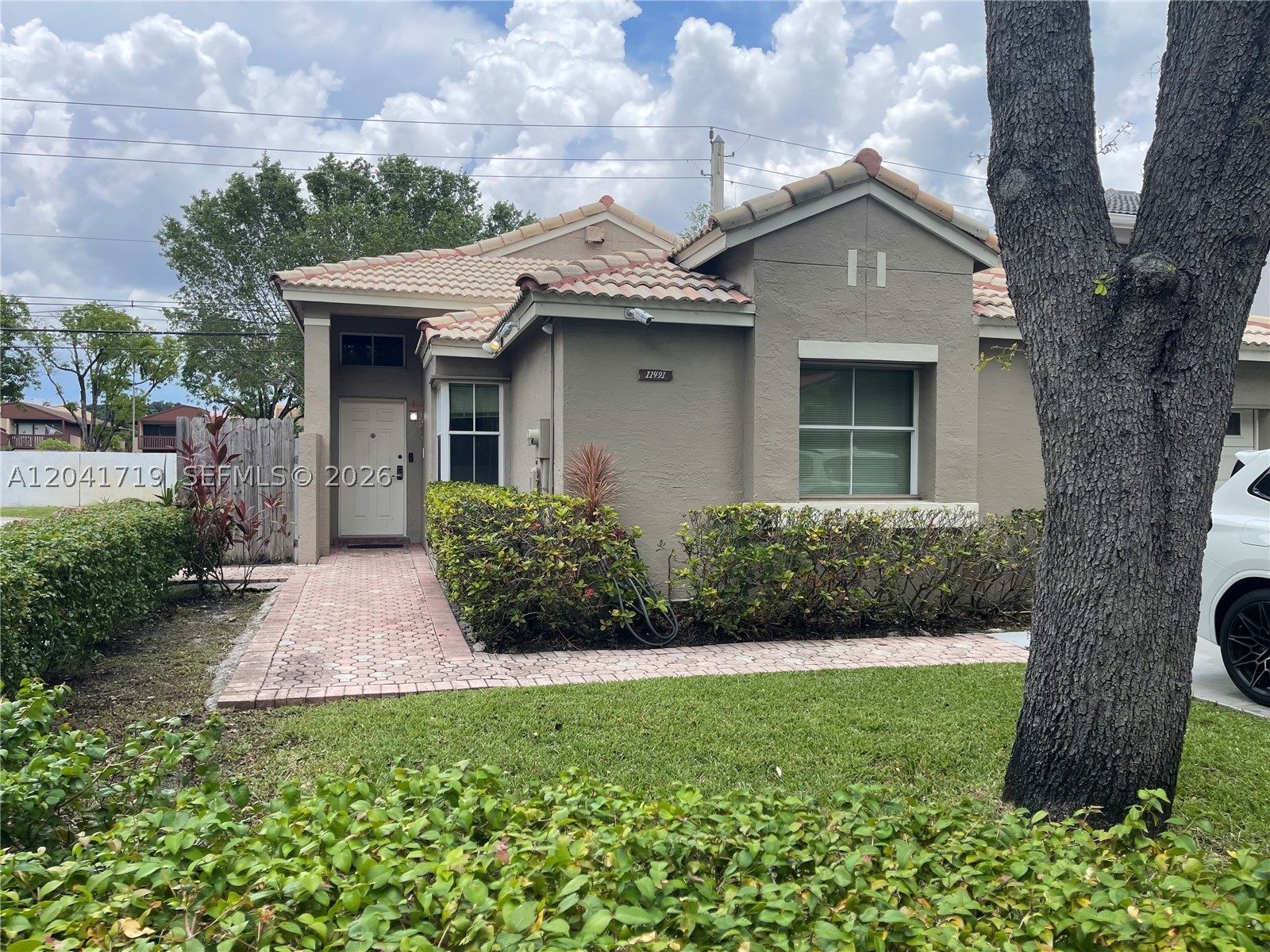 A beautifully maintain 3 bedroom 2 bath South Miami residence ideally located in very desirable location.  Established neighborhood private community where residents enjoy a strong sense of community. The gated community offers a clubhouse,2 swimming pools, playground and tennis courts. Residents also enjoy added piece of mind with police, fire and Ems services located less than a mile away. This spacious home has been upgraded with flooring bathrooms and kitchen. Home offers blend of comfort with 3 walk in closets and new central a/c in 2022. Well located near shopping, BJ'S restaurants, large Metro Dade parks. Don't miss your chance to own this gem. Move in Ready!!