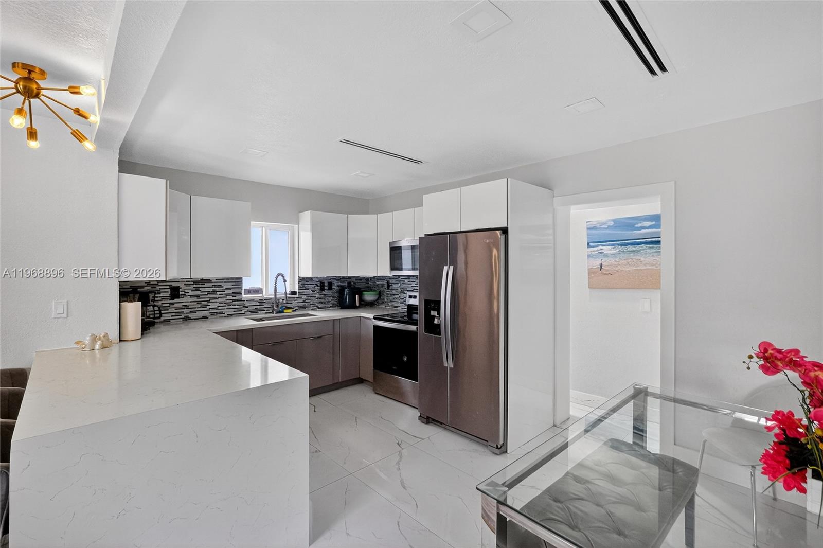 GREAT FOR INVESTORS!!! PERFECT FOR A FAMILY ALSO!!! PRIME LOCATION!!! This house is located in the heart of Design district. walking distance to Wynwood and a few minutes driving to South Beach. Complete renovated 5/3 with 2 full kitchens and the possibility of using one part as 3/2 and another part as 2/1. New owner can use it as a double source of income. This includes a new foundation and flat roof, new plumbing and electrical. modern and stylish stainless steel appliances. This beautiful house is set up as a Smart Home with wifi swiches which seamlessly controls lights, locks, Ring cameras, A/C thermostat and music. The outdoor space is quiet and good neighbors. We recently added a Jacuzzi at the backyard. Also there is a BBQ area. House has a separate shed for storage and laundry.