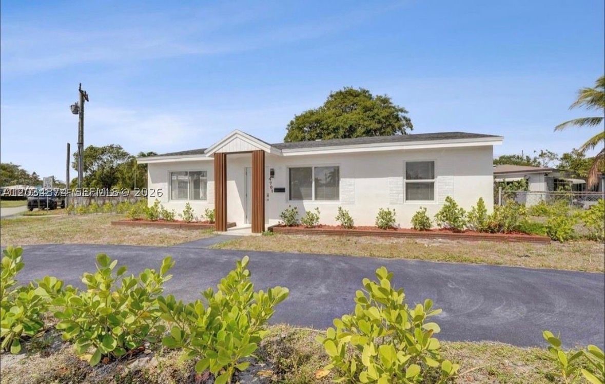 Stunning fully remodeled corner-lot single-family home in the heart of Oakland Park! This move-in-ready residence features 2 bedrooms, 2 bathrooms, and 882 sq. ft. of beautifully updated living space. Recent upgrades include a brand-new 2025 roof, A/C replaced in 2019, and new impact windows and doors installed with permits for added peace of mind. The interior showcases elegant porcelain flooring throughout, creating a modern and cohesive look.

Situated on a spacious 7,372 sq. ft. lot, this property offers a large private backyard with endless possibilities for outdoor entertaining, gardening, or future enhancements. Convenient parking includes a front driveway and covered carport. Best of all, there is no HOA, providing flexibility and freedom for homeowners. Ideally located near shopping, dining, parks, and major highways, this beautifully updated home is a must-see!
