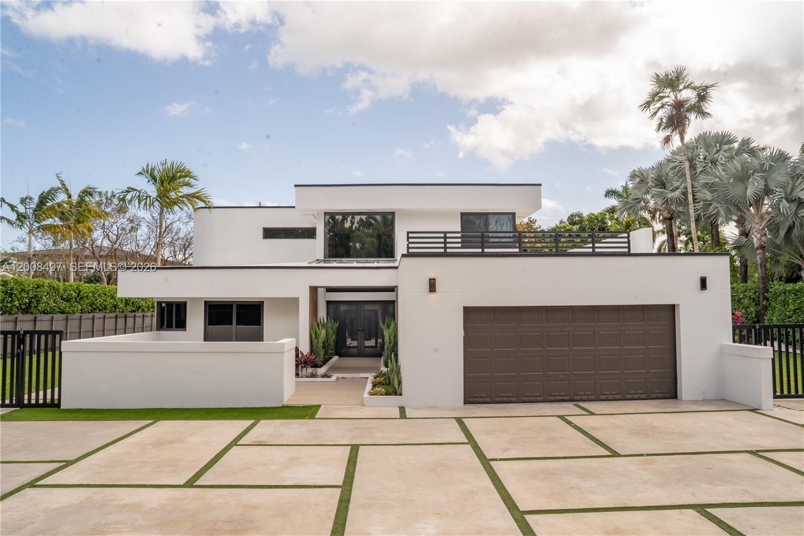 Exquisite modern estate located in the prestigious Village of Pinecrest, offering the perfect blend of sophistication, privacy, and resort-style living. This stunning residence sits on a beautifully landscaped oversized lot and showcases exceptional design, high-end finishes, and seamless indoor-outdoor living.

Step inside to soaring ceilings, expansive open living spaces, and abundant natural light. The gourmet chef’s kitchen features premium appliances, custom cabinetry, and an oversized island ideal for entertaining. Spacious living and dining areas flow effortlessly to the outdoor oasis.

The primary suite is a true retreat, complete with a spa-inspired bathroom, dual vanities, soaking tub, and custom walk-in closets. Additional bedrooms are generously sized, each designed with comfort and style in mind.

Enjoy a spectacular backyard designed for luxury living, featuring a resort-style pool, lush landscaping, and ample space for entertaining or relaxing in total privacy.

Located in one of Miami’s most sought-after neighborhoods, near top-rated schools, fine dining, and premier shopping.