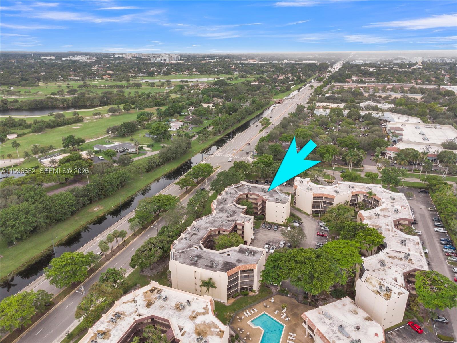 Expansive 2BD 2BA condo in Plantation Club Condominiums. Encompassing over 1100 sf, this beautiful condo unit features a spacious layout, updated kitchen equipped stainless steel appliances, massive living room + dining room combination & NEW impact doors & windows!! Two sets of sliding doors illuminate the home's interior with warm, natural daylight & lead to an oversized, screened-in balcony with a peaceful, quite ambiance. Split floor plan provides ample privacy amongst both bedrooms. The master bedroom ensuite is immense & boasts two sets of closets + a walk-in, & built-in vanity. Plantation Club is an amenity rich community. Homeowners enjoy a community pool + spa/hot tub, clubhouse with abundant seating/meeting areas, gym, sauna, game/activity room & more. Equal Housing Opportunity.