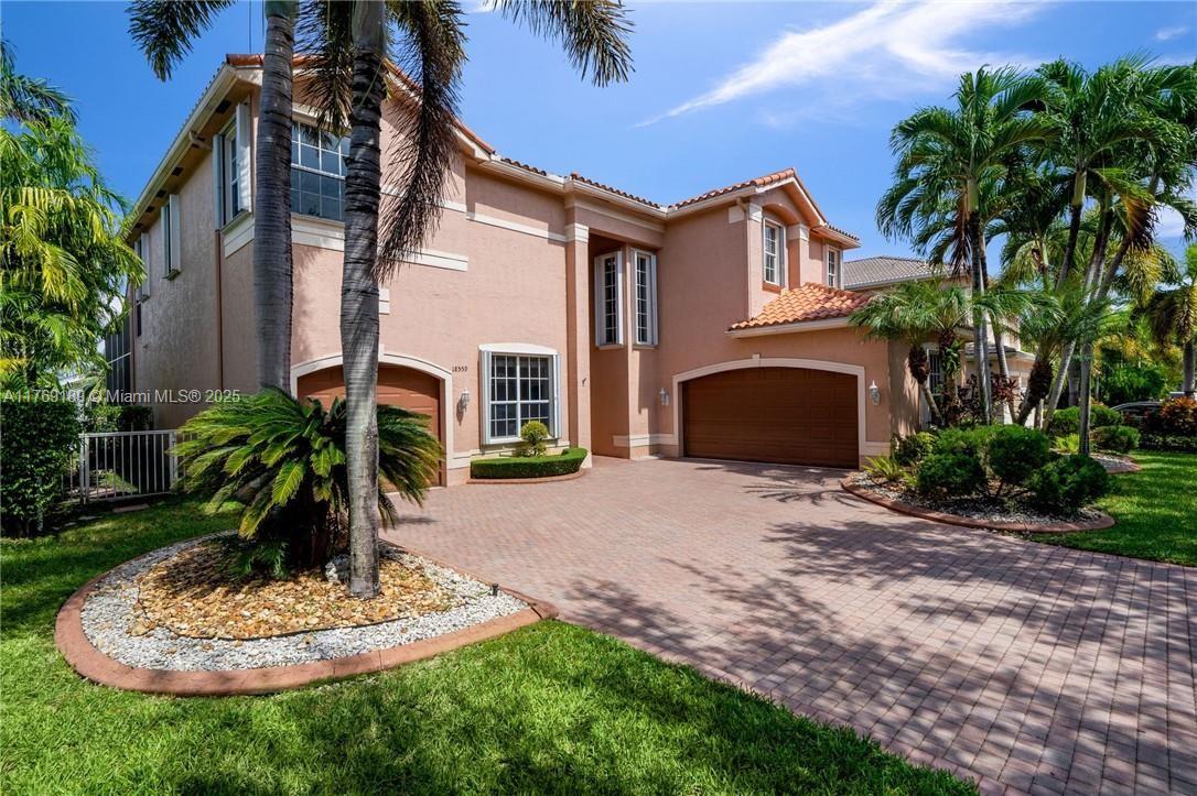 This stunning home offers 4 spacious bedrooms plus a versatile office/den, ideal for remote work or additional living space. With 3.5 bathrooms, this residence provides ample comfort and privacy for family and guests. The highlight of the property is its serene lagoon-front location, perfect for relaxing views and outdoor enjoyment. The backyard features a private pool, offering a perfect retreat for warm days. Don’t miss out on this fantastic opportunity!