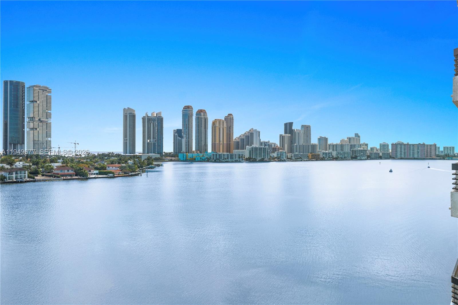 Step into a completely remodeled two bedrooms and two bathrooms condo, where luxury, comfort, and effortless living come together. From the moment you enter, you’ll feel the difference—no detail has been spared. This residence features serene water views and ocean views from every window, spectacular tile floors throughout, smooth ceilings with no popcorn, updated lighting, and a seamless flow designed for modern living.
The custom-made kitchen is a true centerpiece, showcasing top-of-the-line finishes, premium appliances, and refined craftsmanship—perfect for both everyday living and entertaining. Custom doors and custom closets provide a tailored, elegant feel while offering abundant storage throughout the home.
The updated bathrooms are beautifully designed with high-quality finishes and a marvelous soaking tub in the main bathroom—your private retreat at the end of the day. A washer and dryer in the unit, new shutters, and covered parking add convenience and ease to daily living.
Enjoy a lifestyle that feels like a private resort with exceptional amenities including tennis, pickleball, basketball courts, a restaurant, café, mini-market, electric car charging stations, and impeccably maintained lush gardens. The building offers 24/7 security and concierge, providing comfort and peace of mind. Ideally located just minutes from houses of worship, Aventura Mall, world-class dining and shopping, pristine beaches, and two international airports.
CAT ON PREMISES.