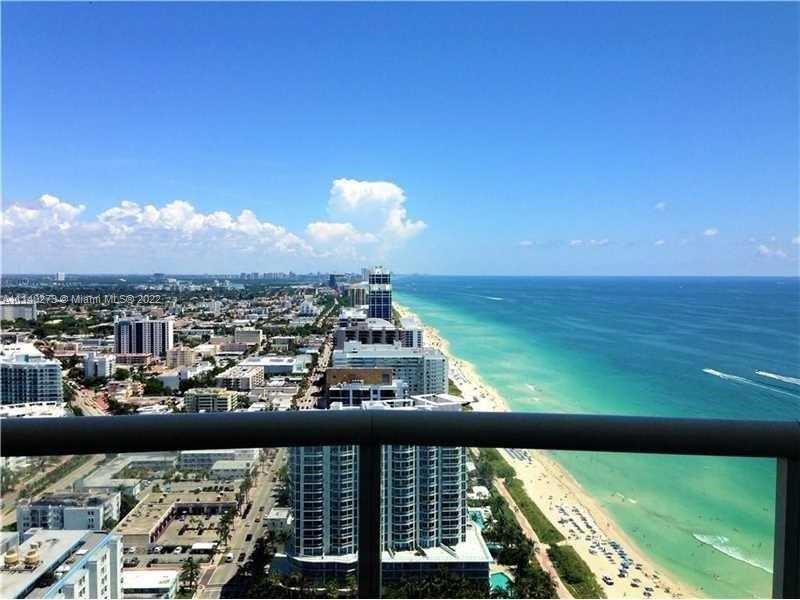 AMAZING PENTHOUSE Large one bed, 2 full baths - 1,151 sq ft - 11 FT CEILINGS - 180 DEGREE VIEWS OF BEACH, BAY AND INTERCOASTAL, SUNRISE TO SUNSET.  CLEAN MODERN READY TO MOVE IN READY, FULL AMENITIES, TENNIS, RAQUET COURT, PUTTING GREEN, SAUNA, JACUZZI, OCEAN VIEW GYMN, BEACH SERVICE, BARBECUE   MONTHLY RENTALS ALLOWED, GREAT INVESTMENT POTENTIAL - ONE OF THE MOST SOUGHT-AFTER LINES IN THE BUILDING, RARELY ON THE MARKET - CAN BE EASILY CONVERTED TO A 2 BEDROOM Qualified Buyers only.  Offers must be accompanied by Pre-Approval Letter or Proof of Funds