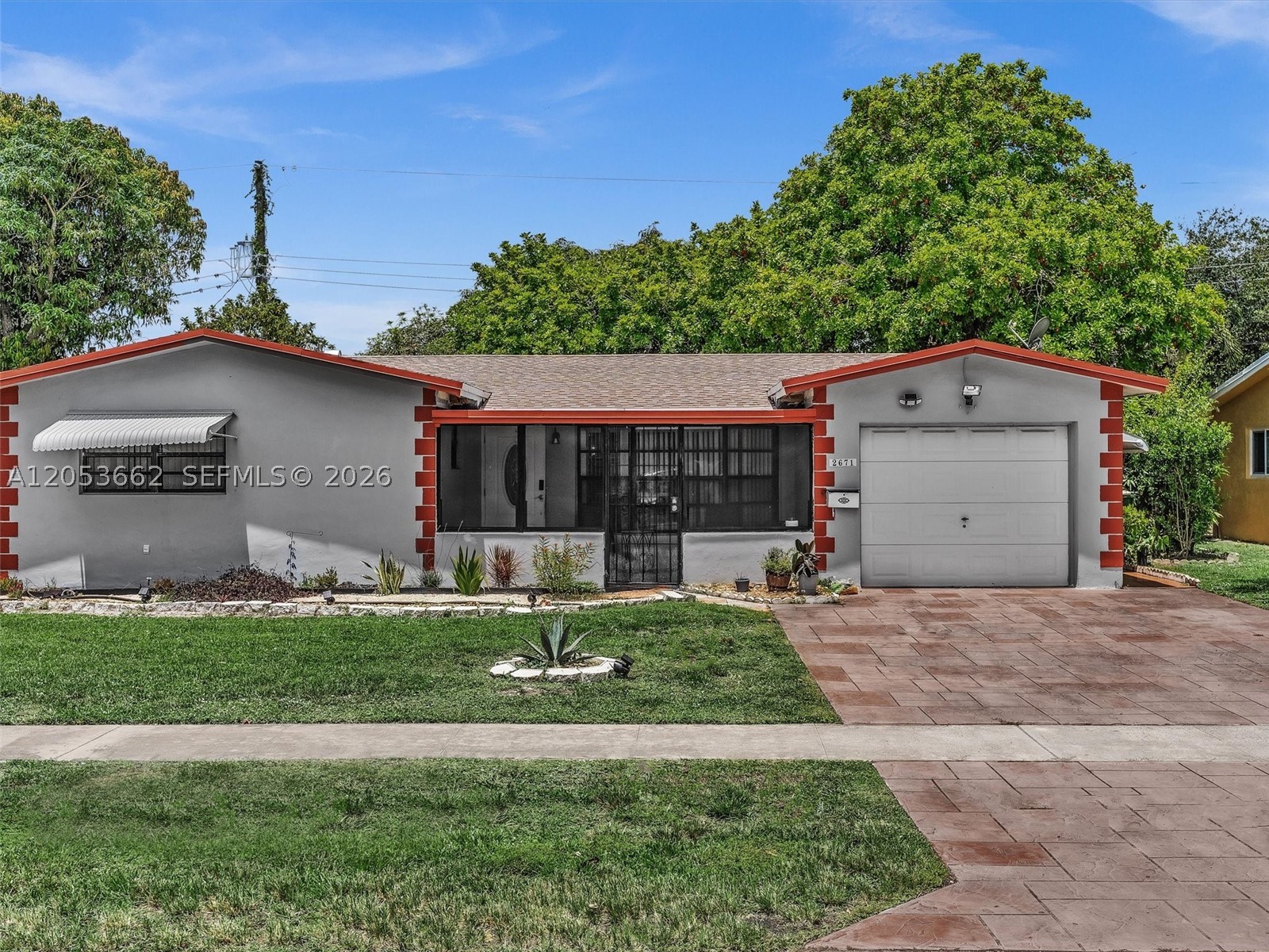 NEW ROOF (2025)! Sold AS IS.

Welcome to this spacious 2 bedroom, 2 bathroom single family home located in an established, family friendly neighborhood in the heart of Lauderhill. Offering over 1,600 square feet of living space, this home features a flexible floor plan with an additional room that can be used as a home office, media room, playroom, fitness room, or other flexible living space to meet your needs.

The spacious living and dining areas are filled with natural light, while the kitchen offers ample cabinetry and generous counter space for everyday living. This home provides an excellent opportunity to personalize the interior while enjoying the benefits of a solid layout and a brand new roof installed in 2025.

Step outside to a large fenced backyard with plenty of space for entertaining, gardening, pets, or creating your own outdoor retreat. An oversized driveway and attached one car garage provide ample parking and storage.

Conveniently located near schools, parks, shopping, restaurants, and major highways, this home offers comfort, convenience, and outstanding potential in one of Lauderhill's established residential communities.