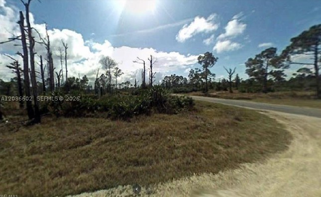 Corner lot in Tropical Gulf Acres. Nearly 0.20 acres (8,465 sq ft) of vacant residential land with canal frontage. Convenient access to US-41 and I-75. No HOA fees. Build your dream home in this growing Punta Gorda community.