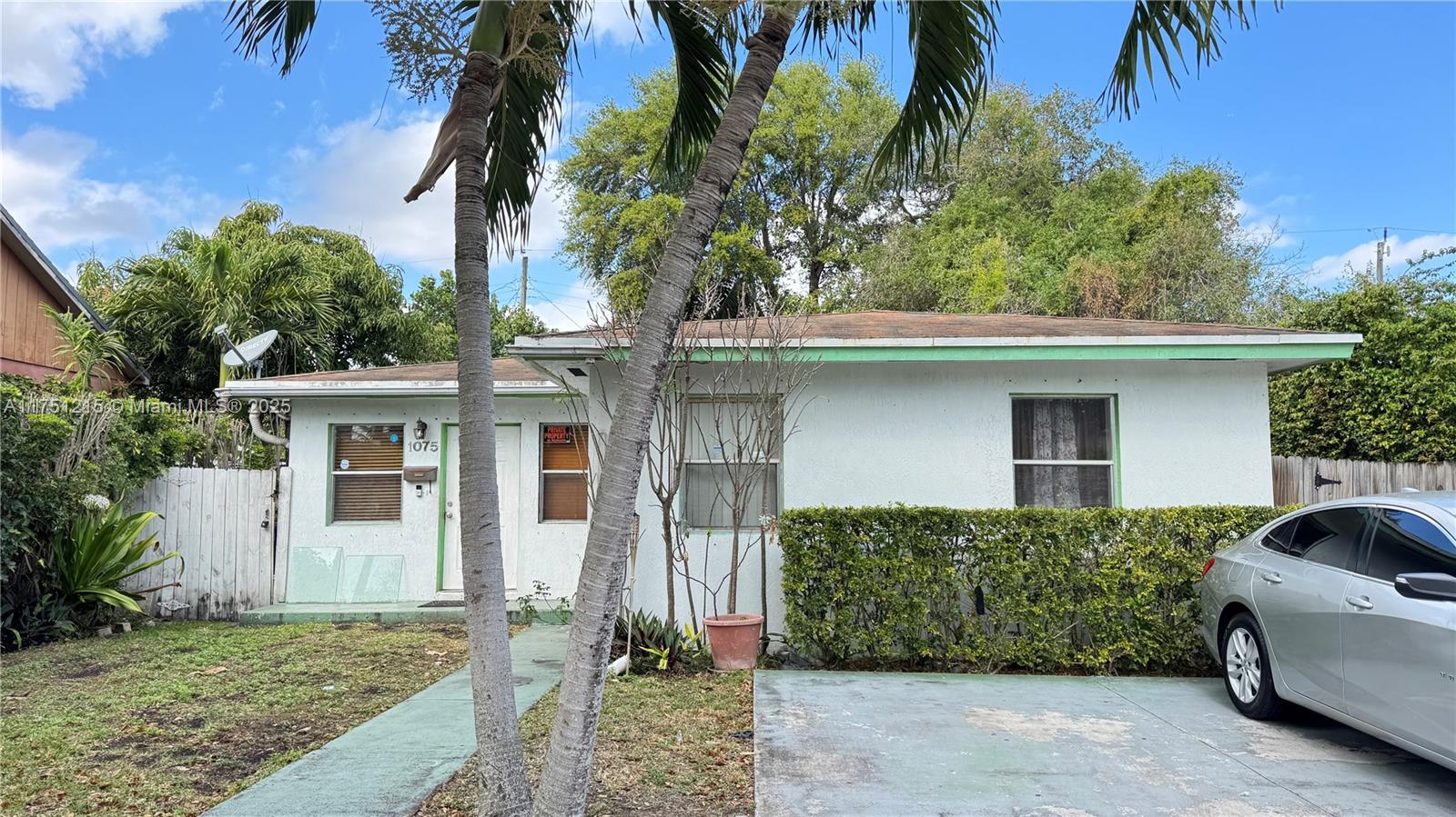 Welcome to a bright, cozy, and functional house that will make a perfect home for you. It has three bedrooms and two bathrooms, located in a quiet neighborhood, close to the Design District, built in 2005. It features a separate laundry room and plenty of closet space in each bedroom. You can enjoy a cool breeze with the new AC, or a warm evening with a gathering on the large patio, don't miss out.