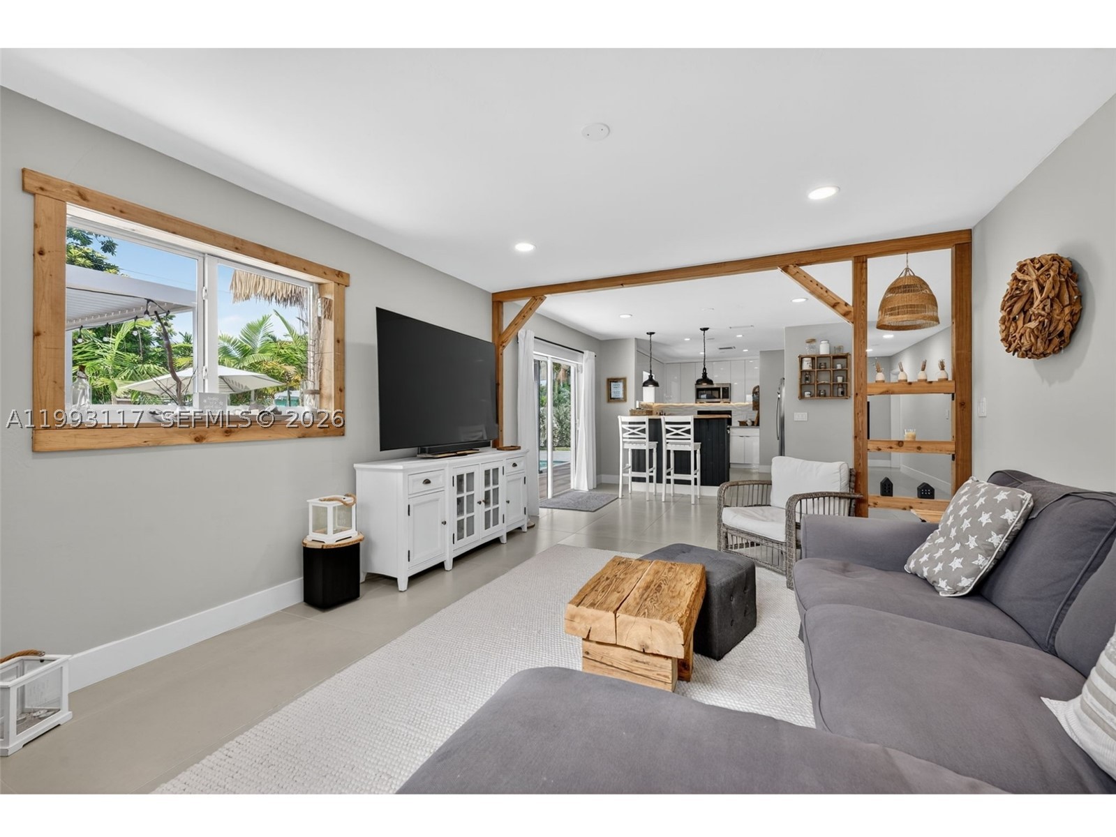 Extensively renovated smart home in Dania Beach with major upgrades completed from 2023–2026. This 3/3 property offers 1,684 sq ft of living area, 1,939 total sq ft, garage, no HOA, no rental restrictions, and dedicated boat or RV parking.
----
Abundant upgrades include impact windows and doors, updated plumbing with PVC sewer lines, updated electrical, modern kitchen and bathrooms, porcelain tile flooring, newer appliances, tankless water heater, recessed LED lighting, smart dimmable switches, alarm sensors, Ring doorbell, new ductwork, attic insulation, and German interior doors with sound seals.
-----
The backyard is designed for outdoor living and entertaining, featuring an automated heated/chilled saltwater pool and spa with beach area, enhanced jets, AquaLink app control, and Speck BADU 4HP SwimJet system. Exterior upgrades include marble pavers, designed landscaping, PVC fencing, gutters connected to the sewer system, and two pergolas.
----
Energy features include an 11.5 kW solar system with Tesla Powerwall 3 battery backup, installed in 2025 and set up for net metering and outage backup. Roof and central A/C were replaced in 2019; a mini-split A/C was added in the primary bedroom in 2025.
----
Recent 2026 improvements include new concrete pad for boat/RV storage, newly paveed along the east and north sides of the backyard, and freshly refinished paving.
----
Close to beaches, marinas, airport, Hollywood Broadwalk, and more!
----
Furniture optional.
