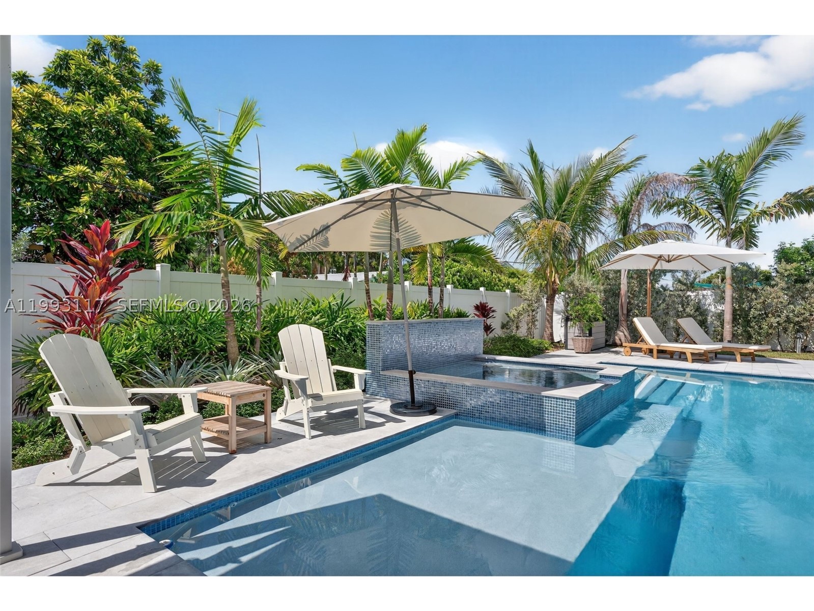 Extensively renovated smart eco-luxury home in Dania Beach (2023–2026). 3/3 property, 1,684 sq ft living (1,939 total), 1-car garage, NO HOA, & NO RENTAL RESTRICTIONS. Perfect primary residence or high-yield Airbnb investment. Dedicated reinforced concrete pad (new 2026) for heavy boat, trailer, or RV parking.

-----

ENERGY & TECH: Eco-friendly 11.5 kW solar with Tesla Powerwall 3 battery backup (2025) for net metering & whole-home outage protection. Central A/C (2019) with new ductwork & insulation + primary bedroom mini-split (2025). Smart dimmable switches, LED lighting, alarm sensors, & Ring doorbell.

-----

OUTDOOR OASIS: Resort backyard with automated heated/chilled saltwater pool & spa, beach entry, & AquaLink app control. Features premium Speck BADU 4HP SwimJet system for lap training. Marble pavers (refinished 2026), 2 pergolas, PVC privacy fence. Gutters tied to new city stormwater drainage project.
-----
INTERIOR & INFRASTRUCTURE: Impact windows & doors, updated electric, and updated plumbing with PVC sewer lines. Modern kitchen & baths with quartz counters, porcelain tile, newer appliances, tankless water heater, and German interior doors with acoustic sound seals.

----

LOCATION: East of US-1. Aligns with Dania Beach’s $32M Southeast Drainage Project for long-term climate resilience, pump stations, & storm protection. Minutes to Dania Beach Pier, Hollywood Broadwalk, marinas, boat ramps, and FLL Airport. Furniture optional. Turnkey No HOA Airbnb!