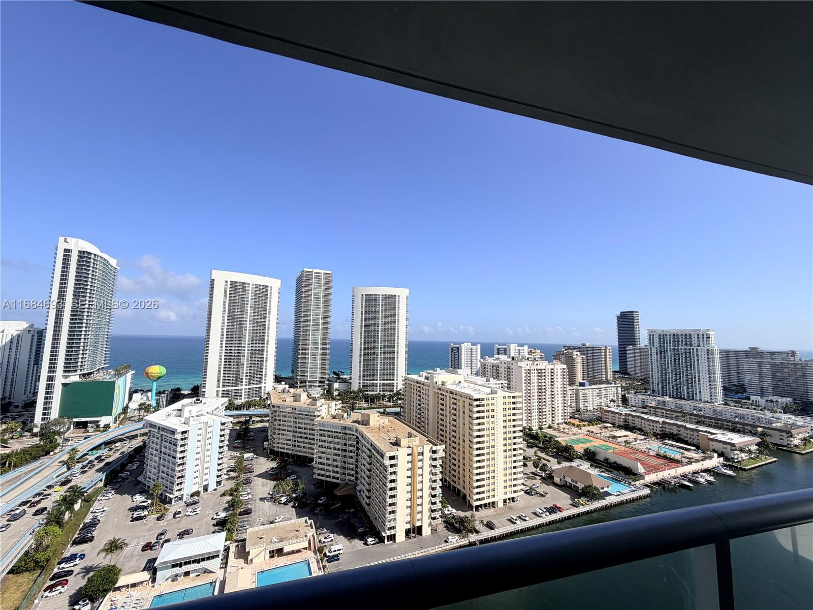 With NEW FLOORS, NEW KITCHEN and superb views of the City, Intracoastal, Ocean, and Direct ocean. This open floor plan features a private elevator, foyer, luxury kitchen, split bedrooms and baths, large wrap-around outdoor living balconies, and access to Beach Front Club House. Enjoy resort-style living with a private rooftop pool deck for OWNERS ONLY, Plus an Intracoastal pool, gym, valet in this premium location. Walk to the beach or be driven by building staff. The unit can be rented by yourself or Airbnb/VRBO.