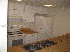 WOODSCAPE TOWNHOMES - Residential Lease