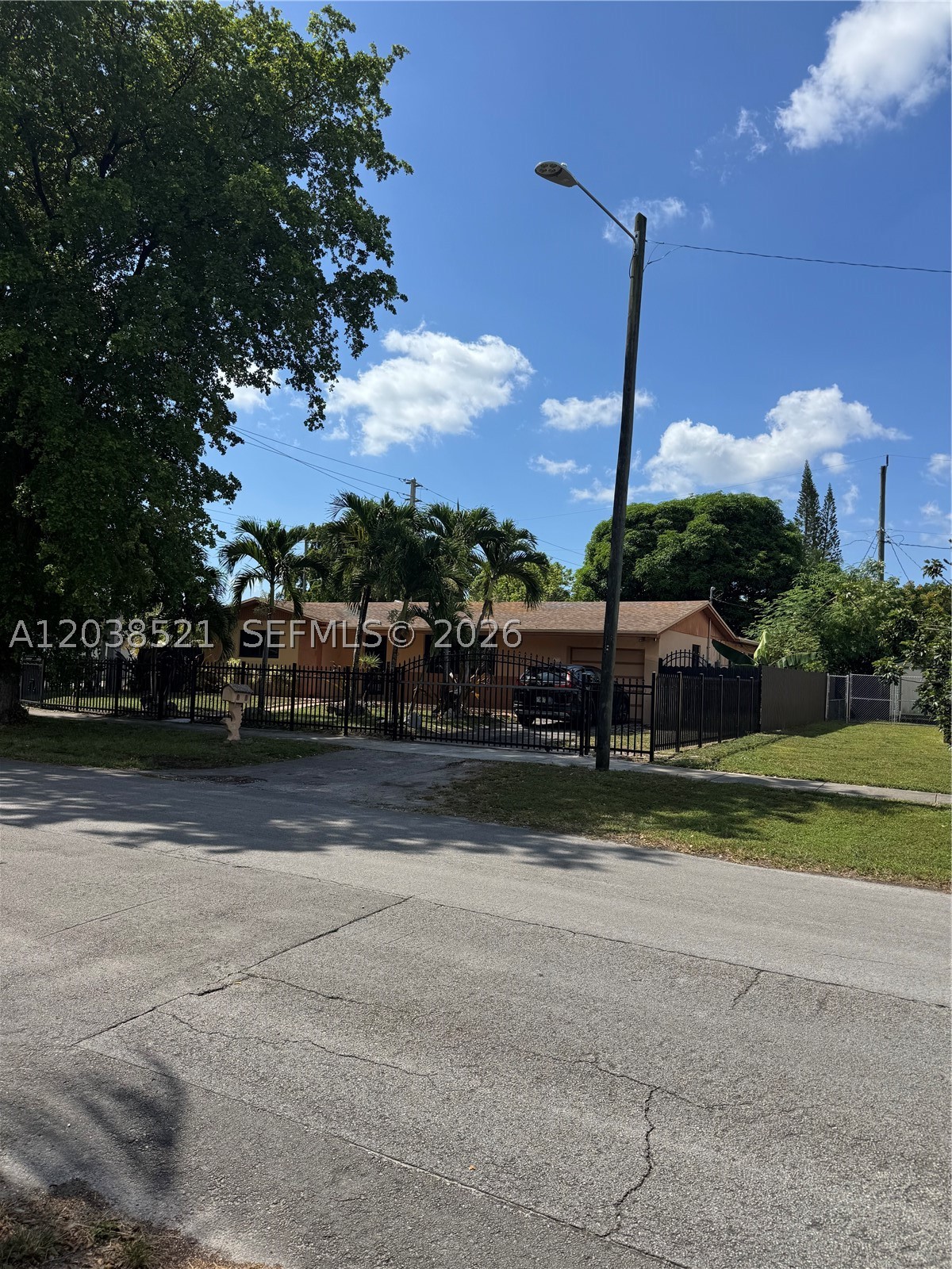 Beautiful corner property with 3 bedrooms & 2 bathrooms, impact windows. Spacious yard with fruit trees and room for a garden and future pool. Parking for boat, truck, or RV. Do not disturb owner.