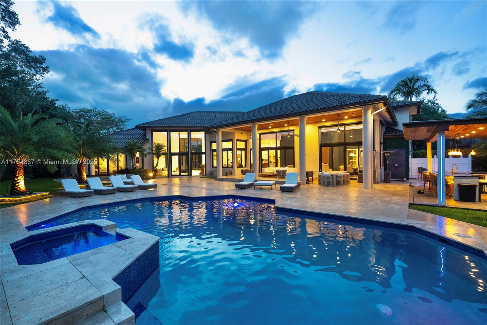 Stunning 6-bed, 5.5-bath waterfront estate in Weston’s exclusive Windmill Ranches. Situated on 1.35 acres, this 6,500+ sq ft home features soaring ceilings, a chef’s kitchen, private theater, office, media room, and spa-like primary suite. Enjoy resort-style outdoor living with a custom pool, summer kitchen, outdoor shower, and tranquil lake views. Zoned for A+ schools and minutes from Weston’s top dining, shopping, and parks. Recently reduced to $4.9M — an incredible value for luxury living. Schedule your private tour today!