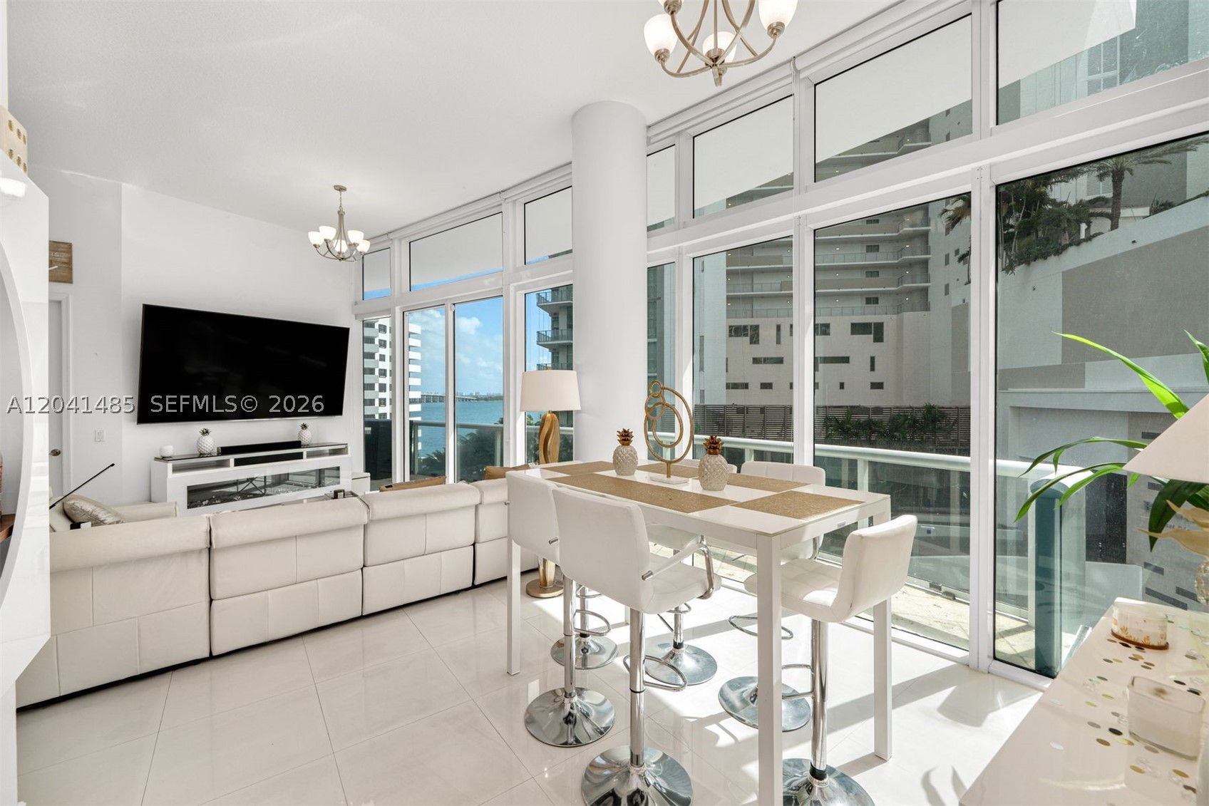 UNBEATABLE VALUE IN EDGEWATER — A rare offering at Platinum Tower. This expansive 3-bedroom, 3-bath residence occupies the entire 5th floor, offering unmatched privacy with no neighboring units on the level. Soaring ceilings and dramatic floor-to-ceiling windows frame beautiful water views and flood the home with natural light. The thoughtful layout offers generous living and entertaining spaces, complemented by a large private balcony perfect for taking in the surrounding views. For ultimate convenience, assigned parking is located on the same floor, allowing seamless, private access directly to the residence. Spacious bedrooms, elegant flow, and a truly one-of-a-kind full-floor layout make this home a standout opportunity. Ideally located in the heart of Edgewater, just minutes from the Design District, Midtown, Wynwood, and Miami Beach.