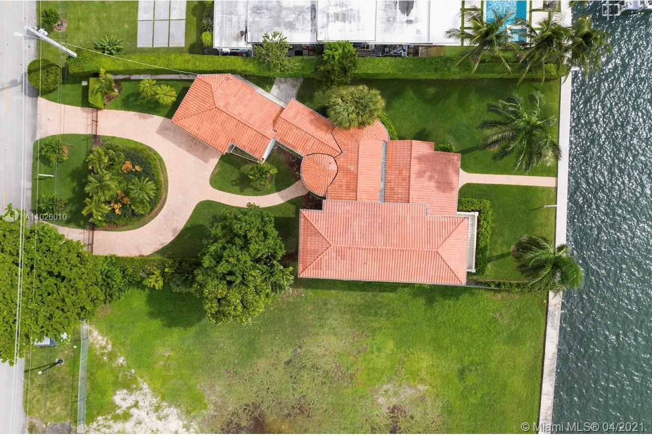 New 2021 Waterfront Home Listing on Bay Drive. 
One of the last Opportunities in this Area. The Best Panoramic Water Views in a charming House. Enjoy sublime Sunsets and enchanting Sunrises. This two-story 5 bedroom 5 bath home on a huge 13,000 sq. ft. lot, with 77 feet of waterfront, filled with incredibly beautiful daylight, high ceilings and Art Deco moldings, gas fireplace, large bedrooms, main bedrooms up and down. Kitchen and baths have been renovated plus impact windows, 2 car garage, and a large outdoor patio overlooking the fabulous Biscayne Bay. Ready to move in! 
Won't last long in this Market!