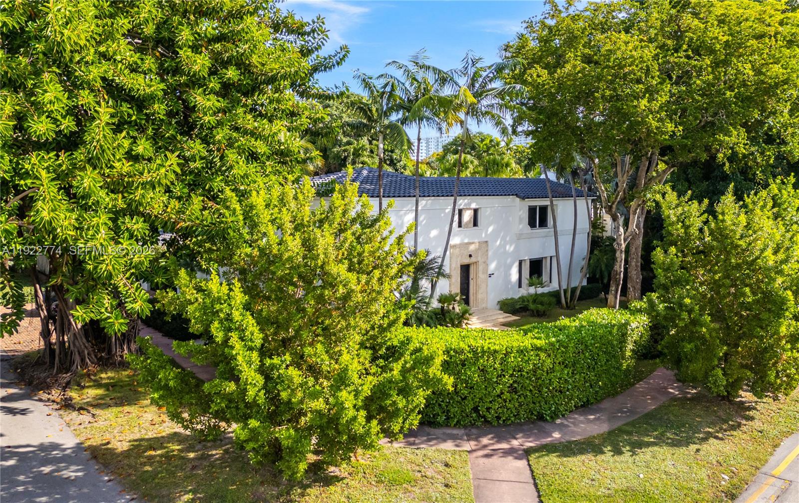 Lovely La Gorce Drive! Rarely available & tastefully renovated, this stately Mediterranean villa offers 5 bedrooms, 5.5 baths, & timeless elegance on a 9,639 SF gated corner lot. Recently enhanced with a new roof, new landscaping/fencing, & a new backyard pool deck, the property blends classic architecture with modern comfort, creating a truly move-in-ready Miami Beach retreat. Lush tropical grounds wrap around the backyard with heated pool, Al Fresco dining, soaring mature trees, & privacy hedges. Inside, stunning architectural details & millwork elevate every room. Enjoy a modern open gas kitchen with top-tier appliances, formal dining room, & sophisticated living areas which all open with French doors to the pool area. The huge downstairs primary suite is a sanctuary of its own, featuring a sitting room & dual dressing rooms/closets. Upstairs, three spacious bedrooms each offer ensuite baths, plus access to an outdoor balcony. A separate 1BD/1BA guest or staff quarters adds valuable flexibility. Driveway is accessed from the quiet side street—meaning you never have to back out onto La Gorce Drive & enjoy easier, low-traffic entry & exit. Nestled in one of Miami Beach’s most coveted neighborhoods, this prime location offers unmatched convenience & lifestyle. Moments from La Gorce Country Club, top-rated schools, beaches, parks, & the 41st Street corridor. Perfectly positioned between Mid-Beach, South Beach, & Surfside. Just 15 minutes to MIA Airport!