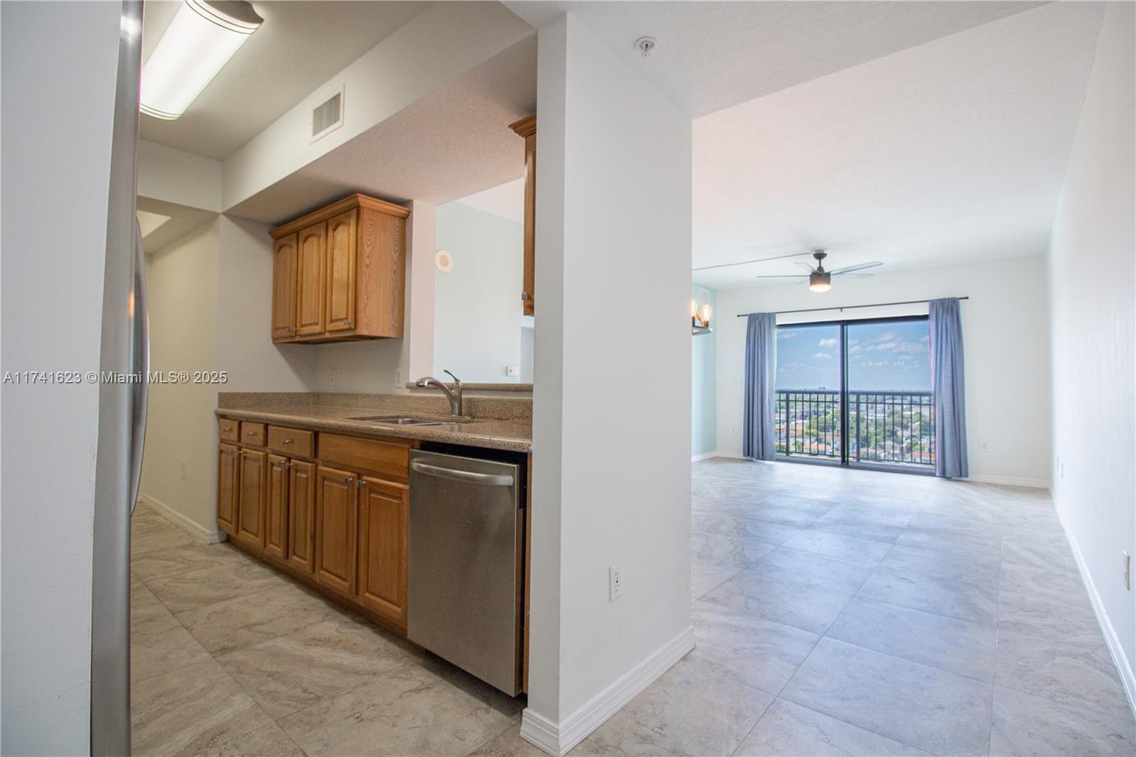 This stunning 1-bedroom, 1-bath condo unit, located on the 11th floor of the Keystone Park Condo building in Miami, offers 744 square feet of modern living space with breathtaking skyline city views. The unit features a spacious open balcony, perfect for enjoying the vibrant Miami skyline. Inside, you’ll find a well-designed layout with a den space that can easily serve as an office area. The condo boasts sleek stainless steel appliances, new lighting, and a convenient washer and dryer in-unit tucked away in your own private laundry room. The bathroom is nicely updated with a bidet for added comfort. Enjoy peace of mind with 24/7 security and secure entrance access. Plus, with low HOA fees, this condo offers the perfect balance of luxury and affordability in a prime location.